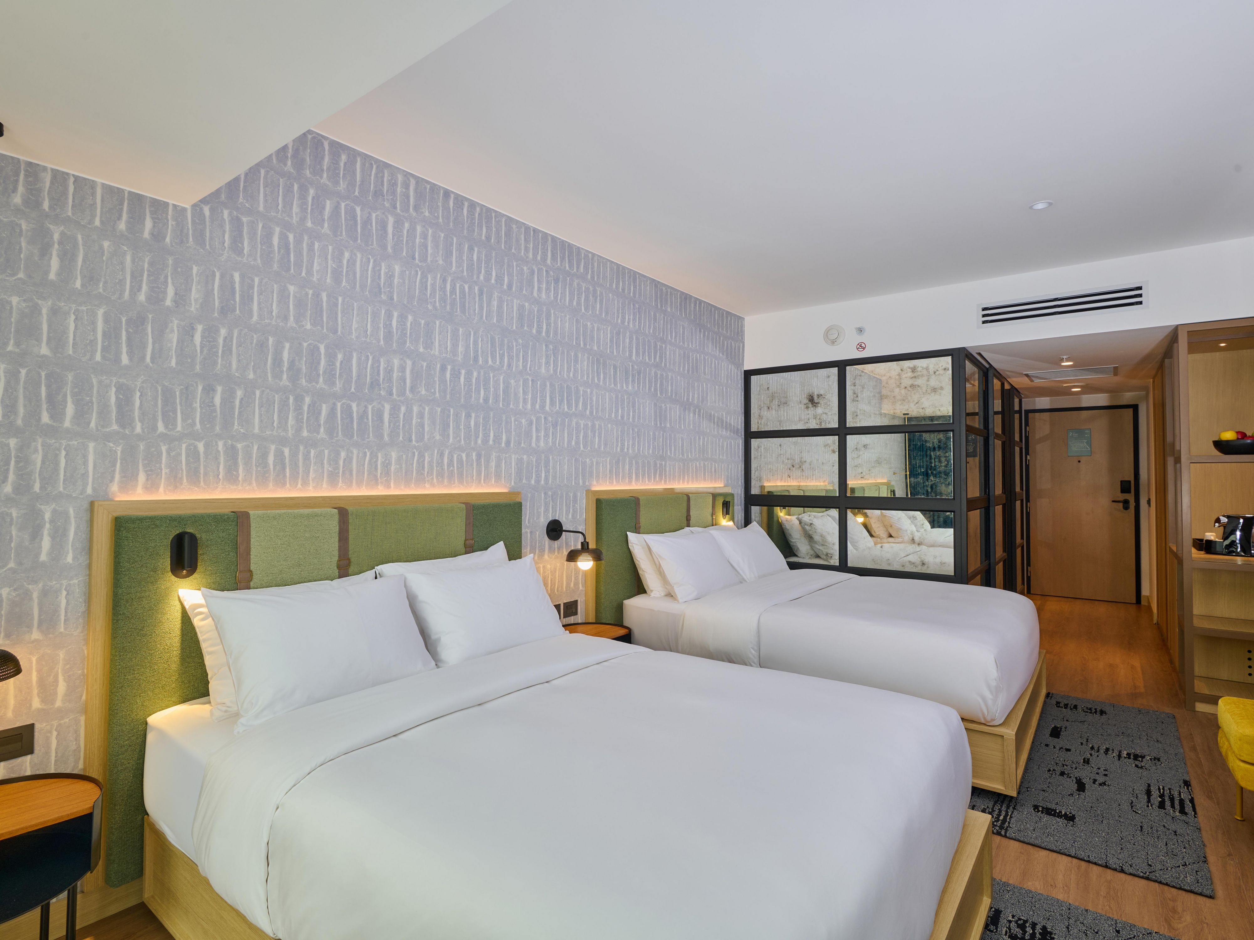 A peaceful guest room designed for relaxation and quiet rest.