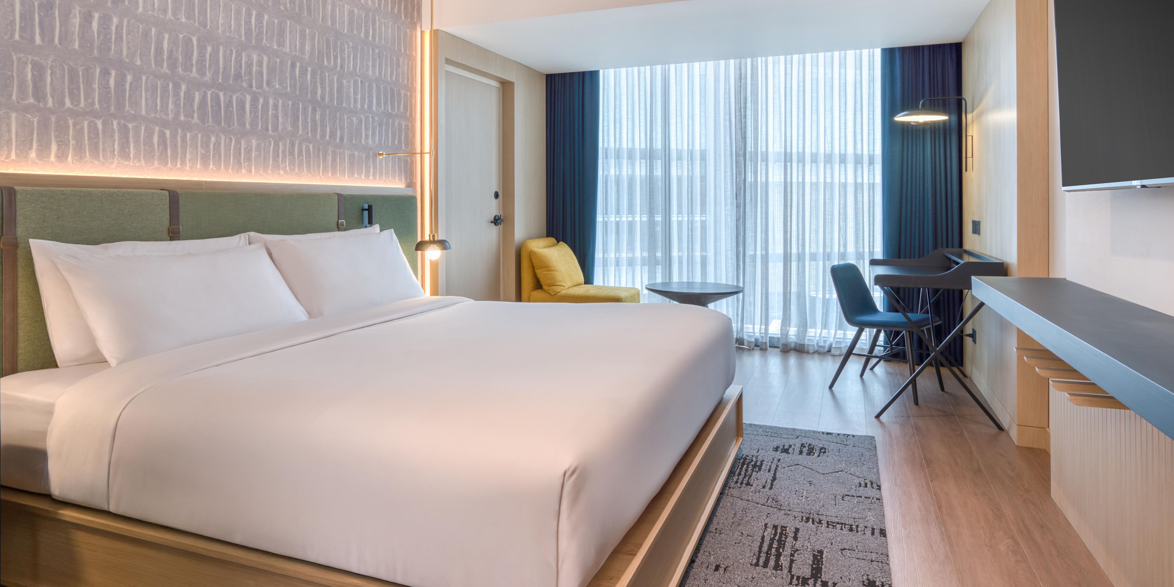 Pull back the covers, hop in, and catch your favorite TV show.