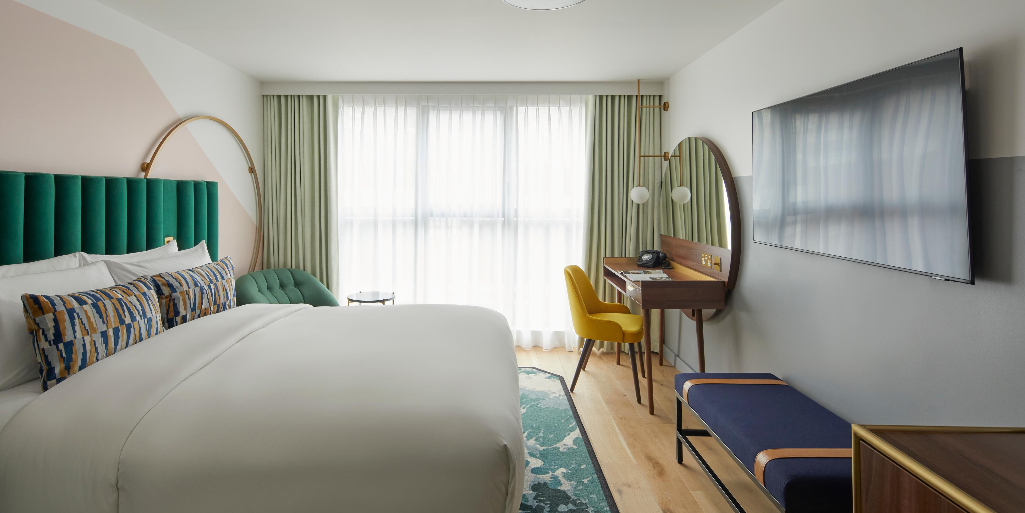 Gold accents and circular touches define our Goldsmith bedrooms