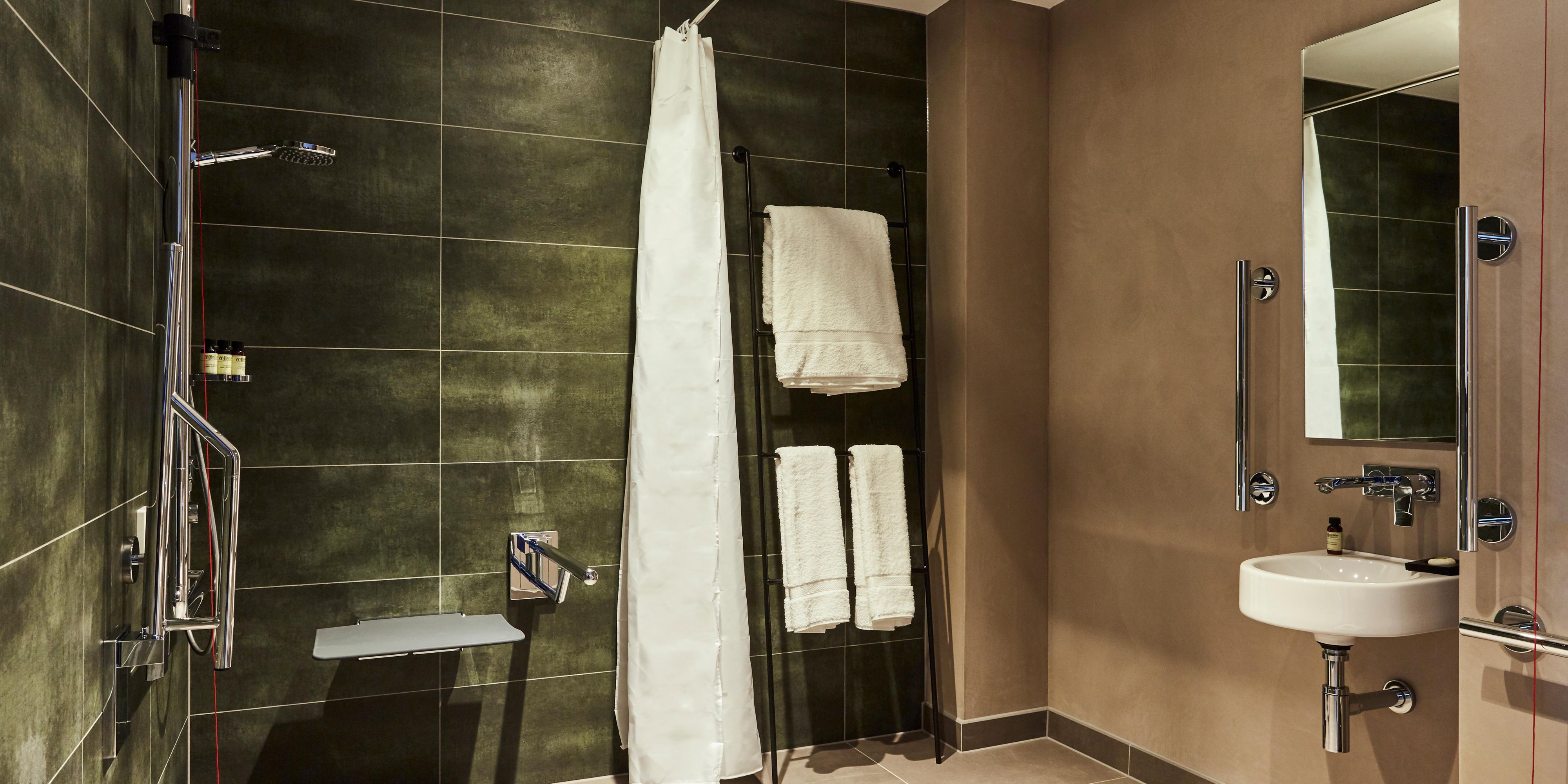 Spacious Roll-in Shower in our Accessible Guest Queen Bedrooms
