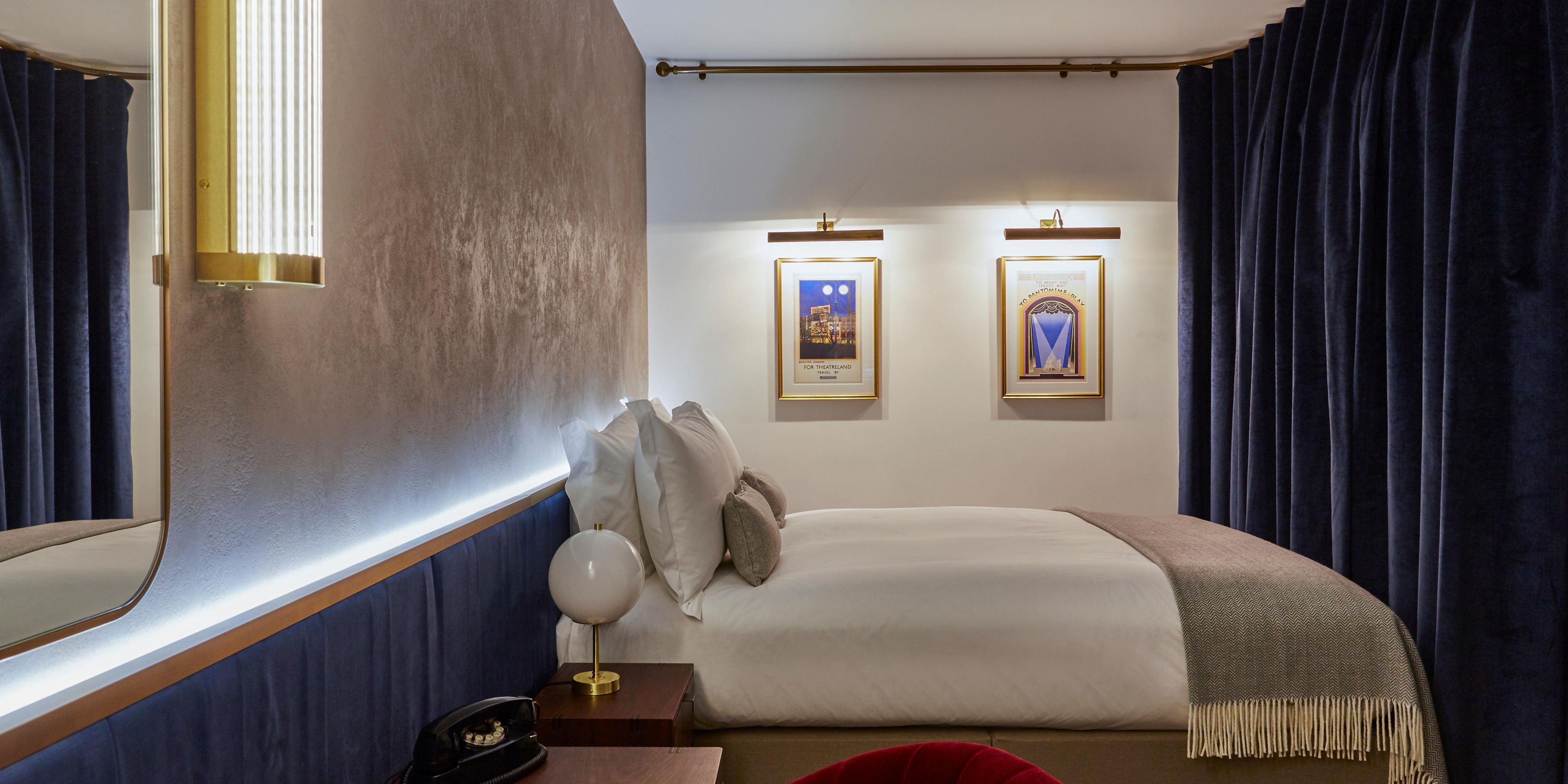Quiet Windowless Theatre Themed Queen Guest room with Hypnos Bed
