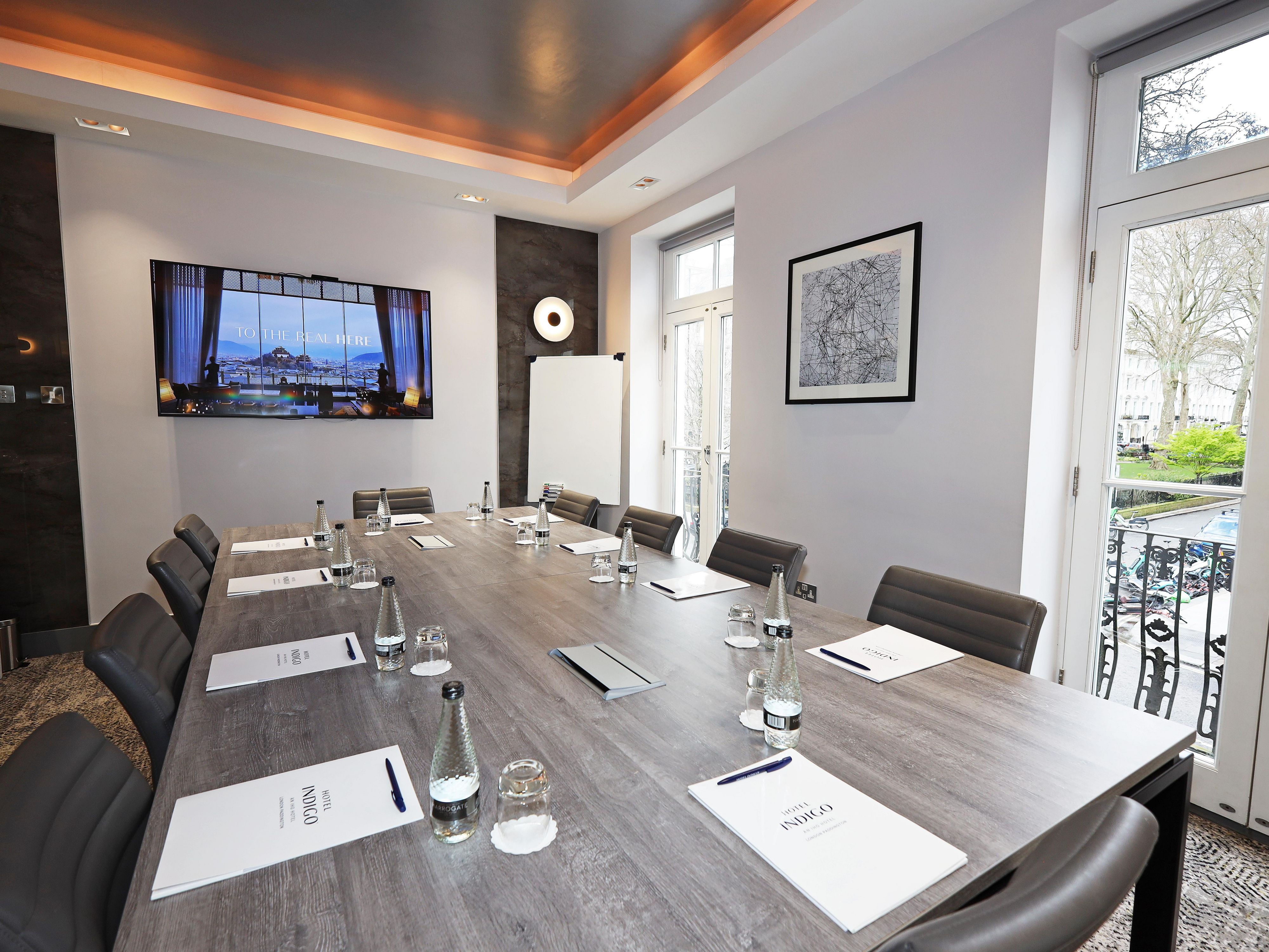 Meet in style with free high-speed WiFi, air con and smart TV