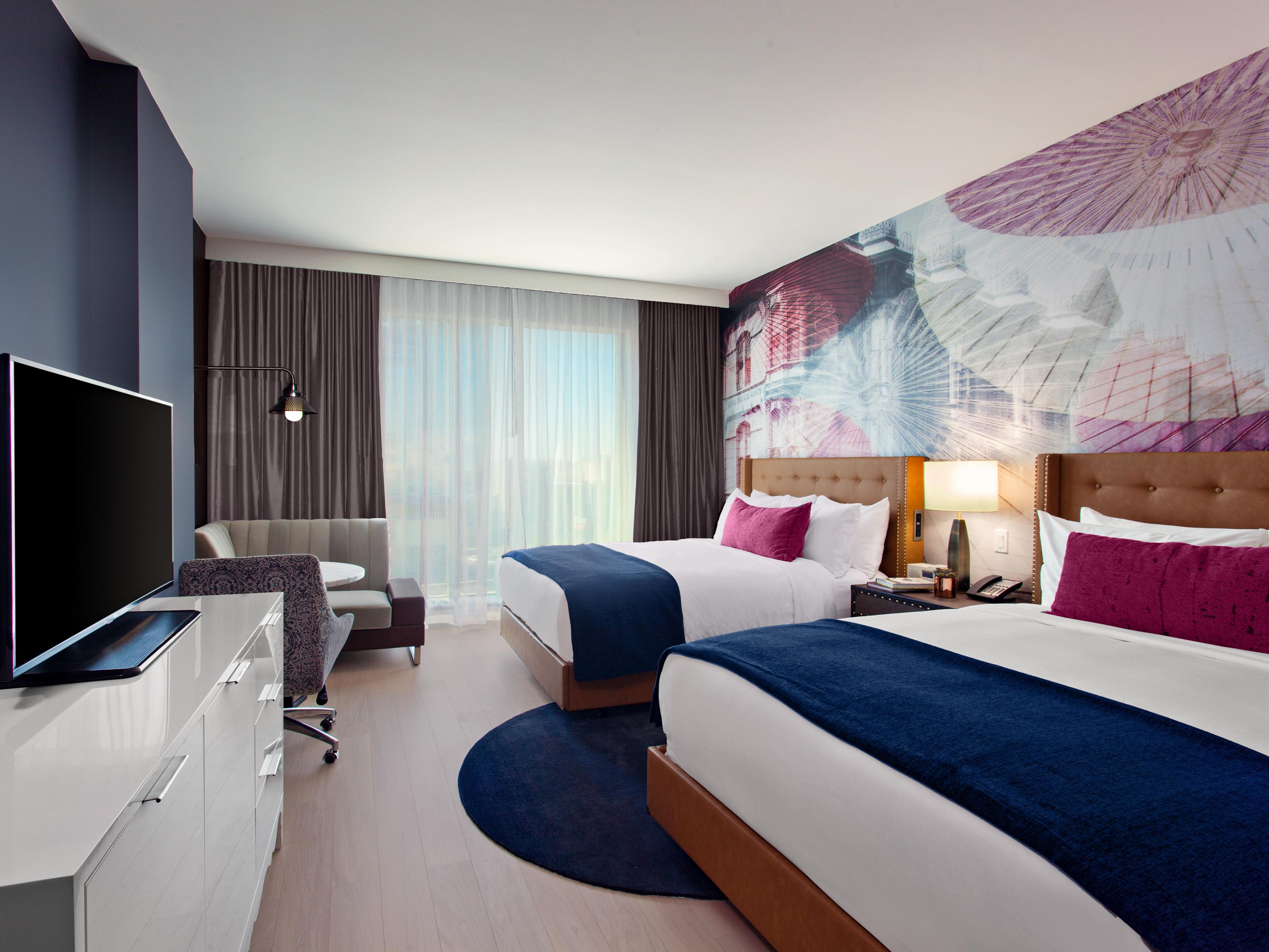 Lounge and relax in our guestroom with two queen beds.