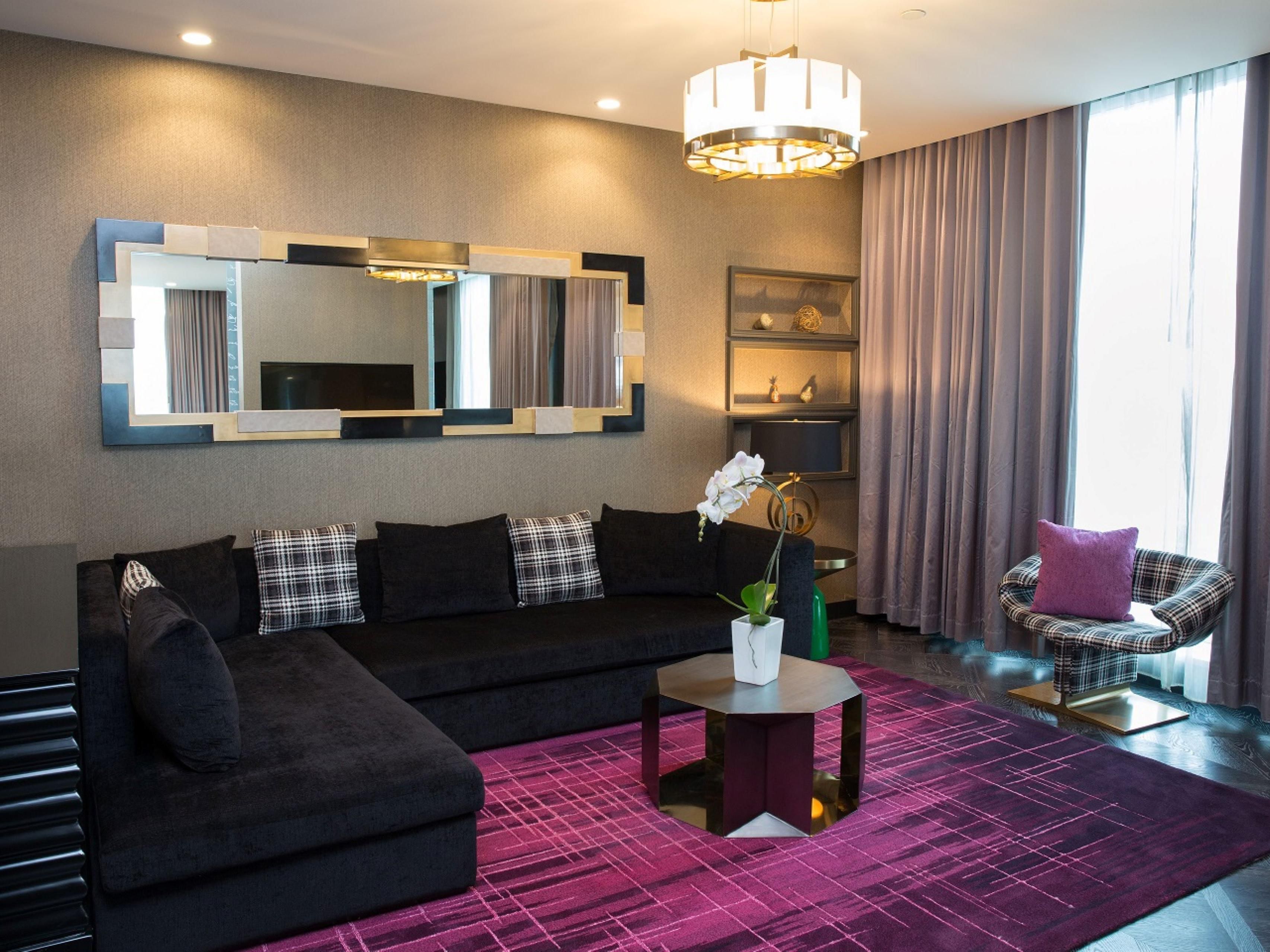 Lounge and relax in our guest room with a pull-out sleeper sofa.