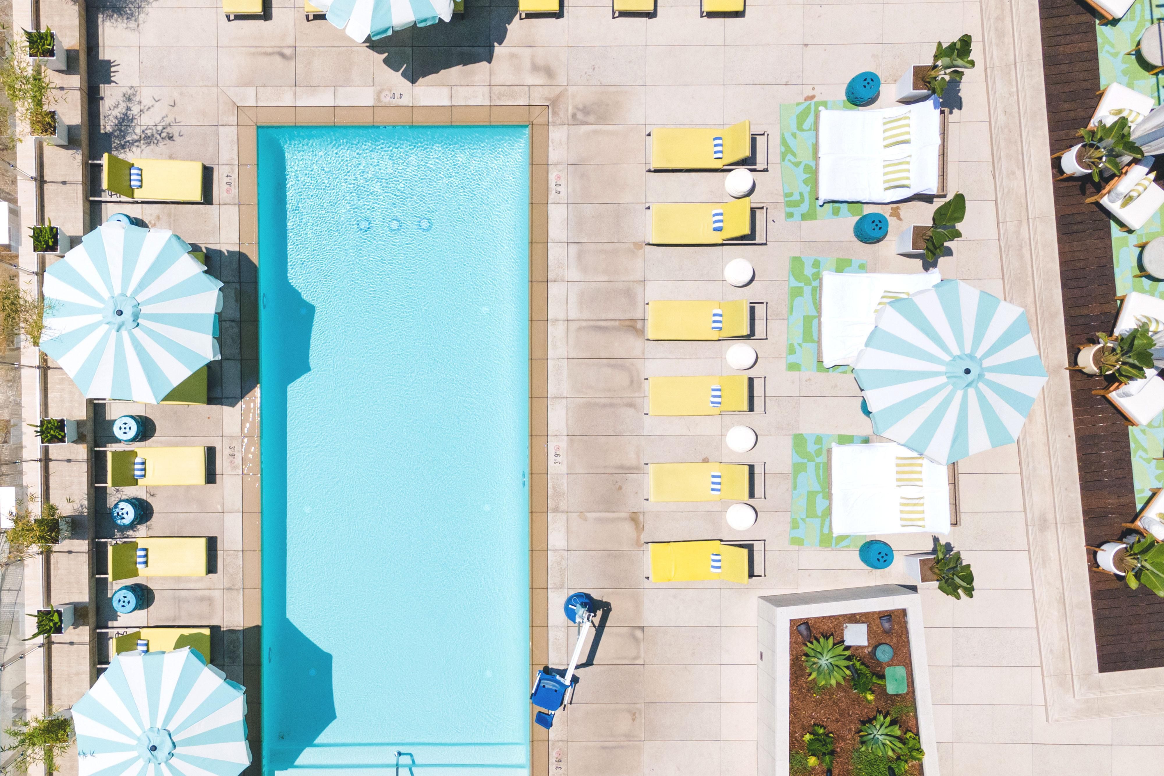Dive into poolside bliss at our year-round, heated, outdoor pool. Enjoy a refreshing swim, bask in the California sunshine, or unwind in one of our stylish cabanas, adding a touch of luxury to your poolside experience. Elevate your experience with The Swim Club, featuring exclusive poolside service. 