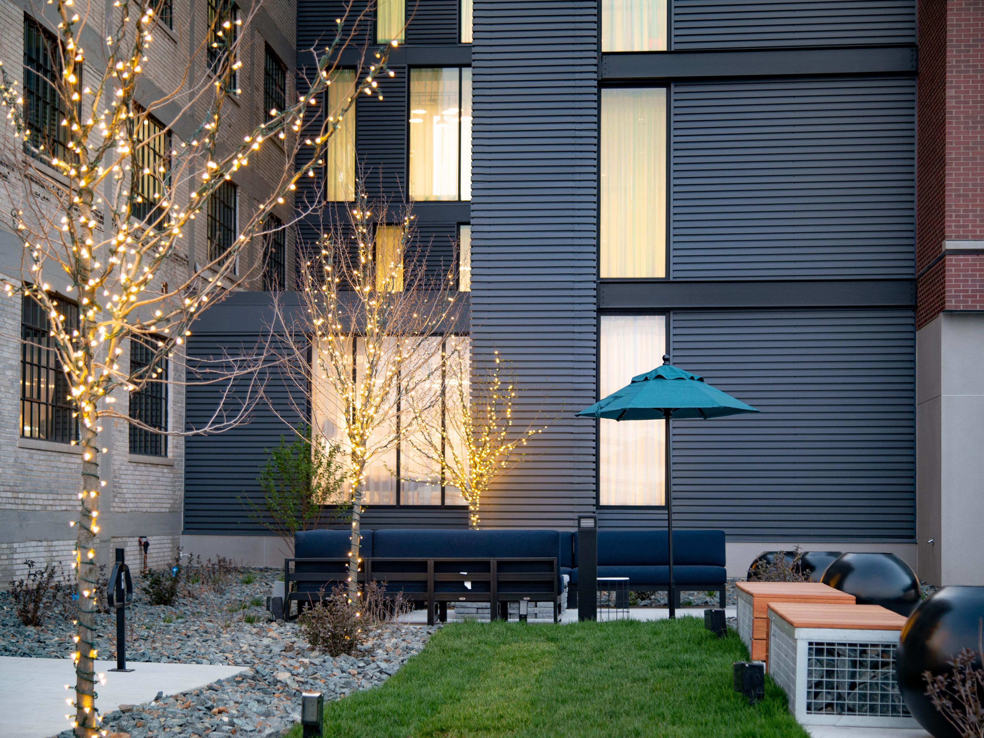 Hotel outdoor patio fire pit and dog walking area