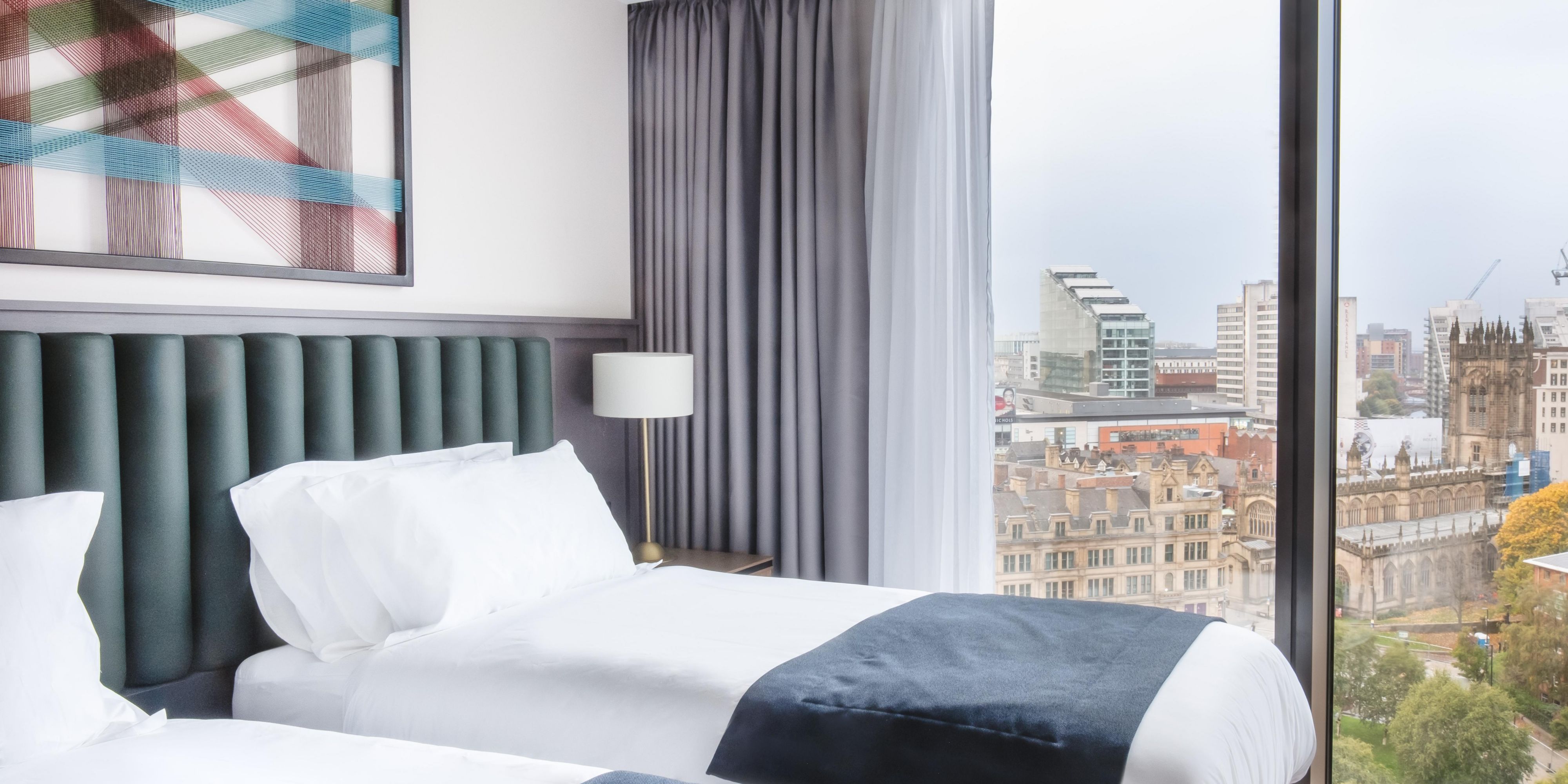 Comfortable Twin bedded room overlooking the city of Manchester