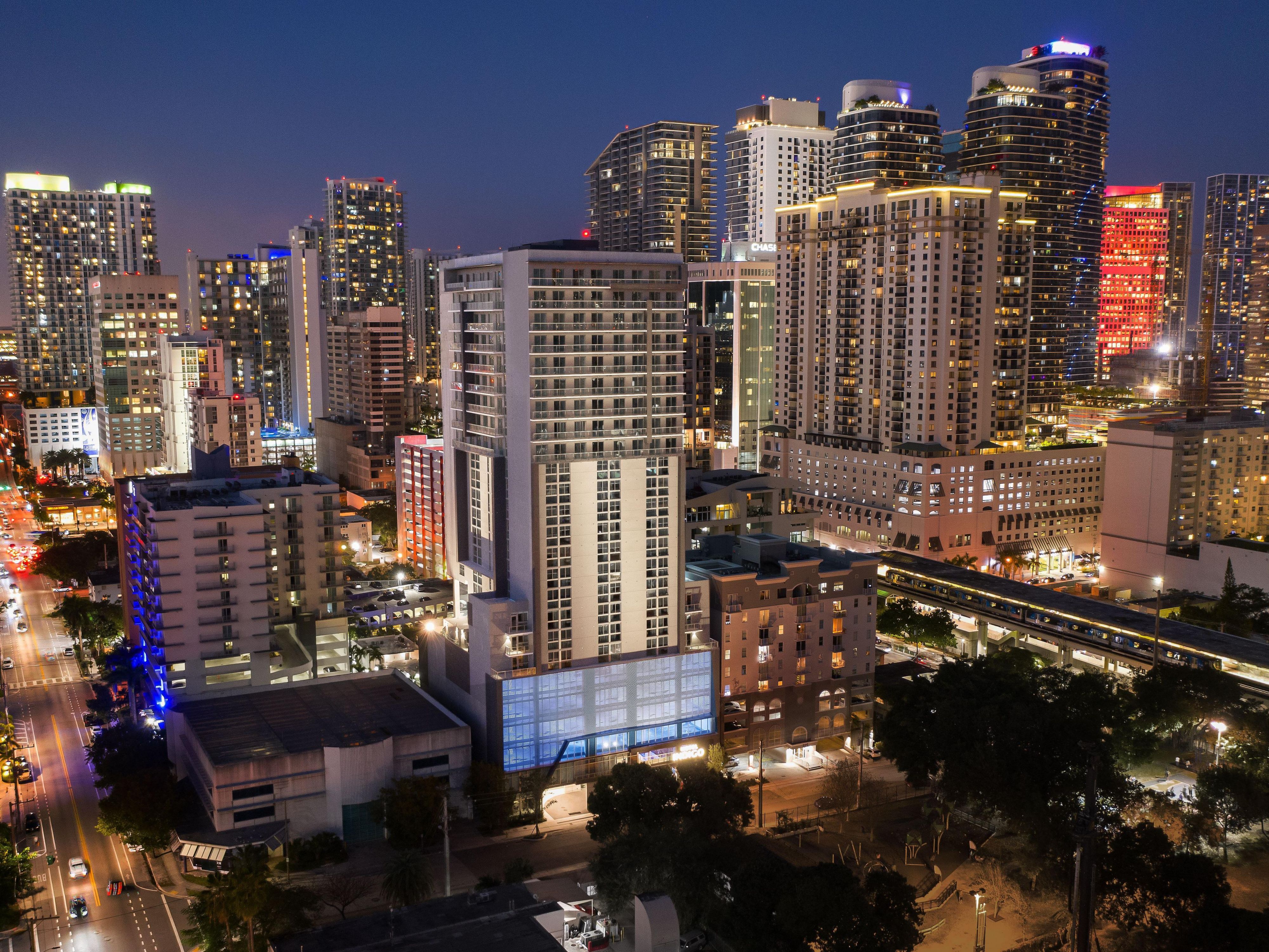 Nestled in the heart of Brickell, our hotel offers easy access to public transportation, shopping, and dining. Enjoy the beach just 15 minutes away and major stadiums and venues within a short drive. With the airport only 20 minutes from us, our prime location is perfect for both business and leisure travelers looking to explore the vibrant area. 