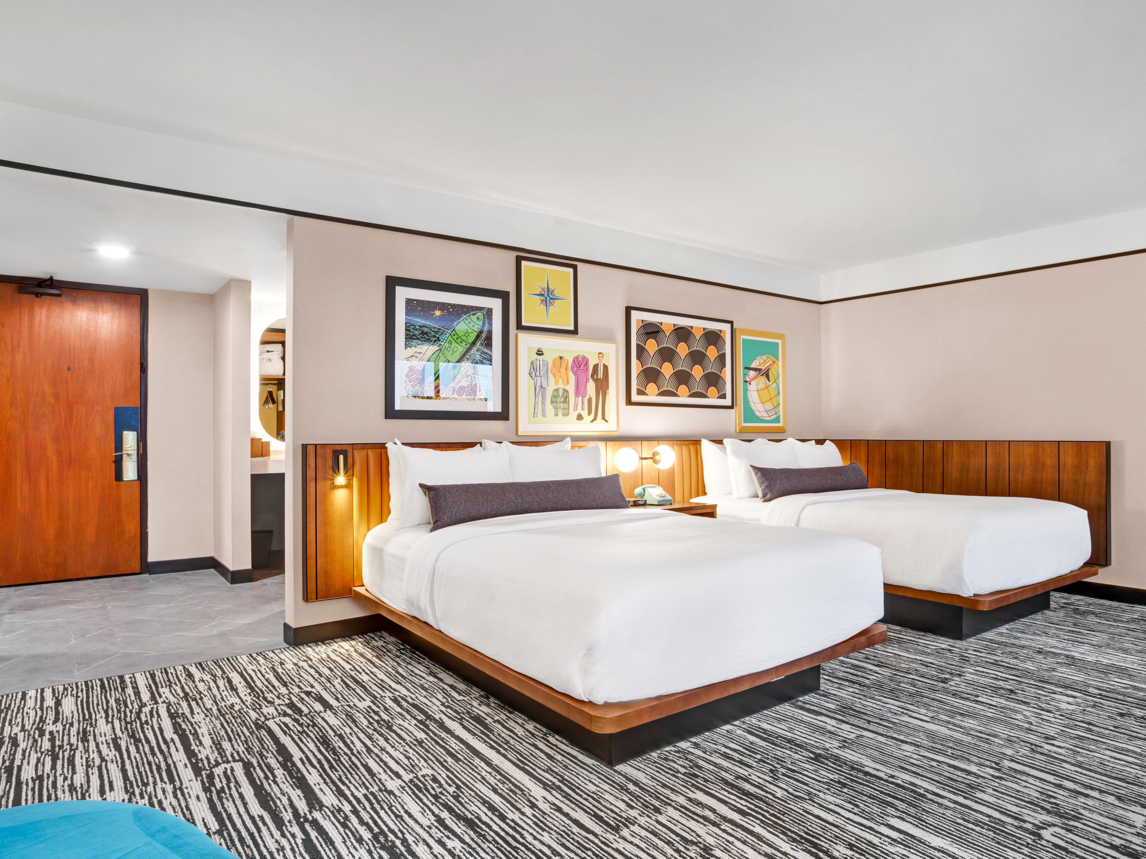 Two queens, one sofa, and plenty of space to make it yours.