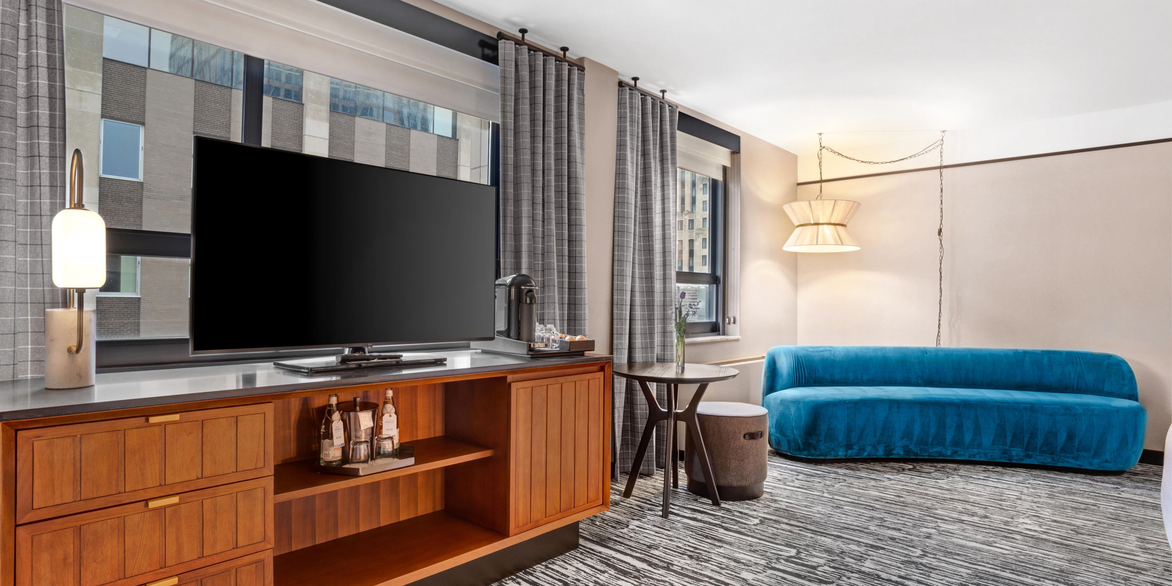 Nespresso mornings, streaming nights—your room, your way.