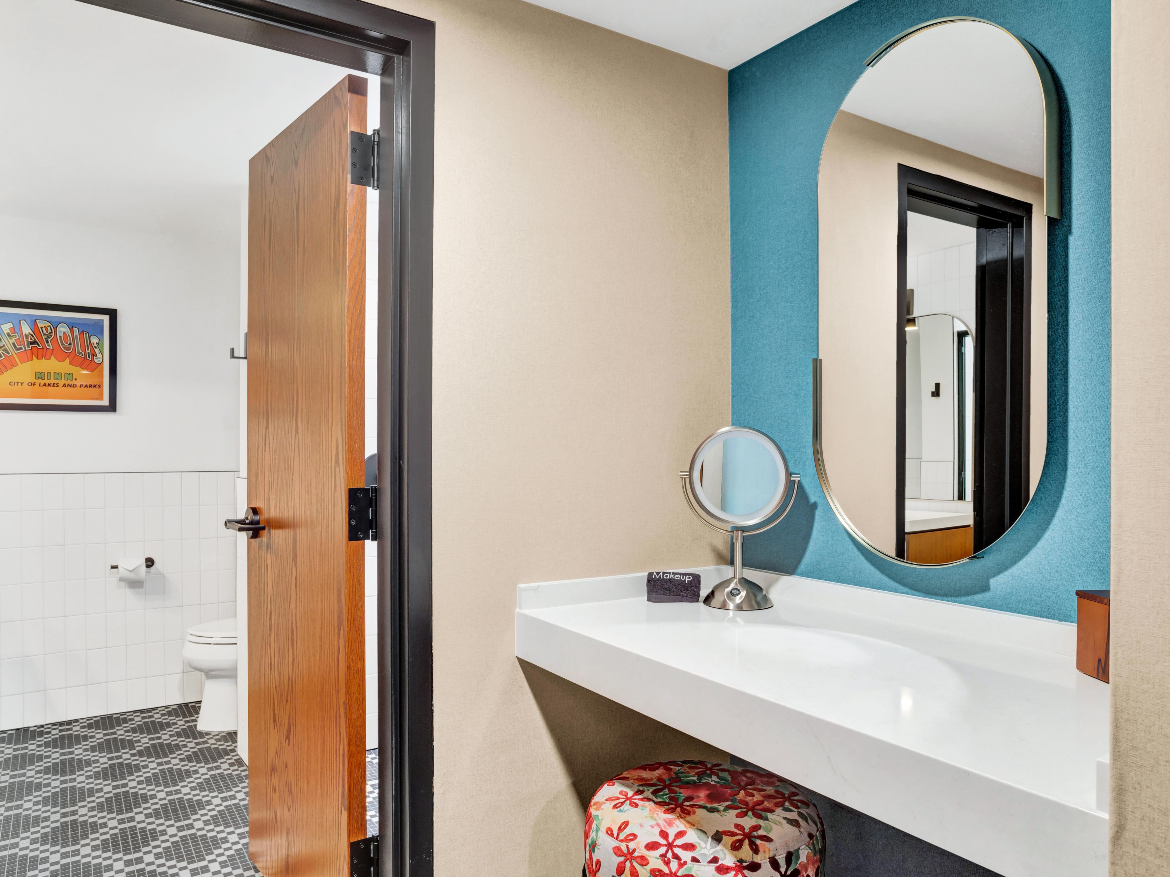 Get ready in style with a chic vanity and retro stool.