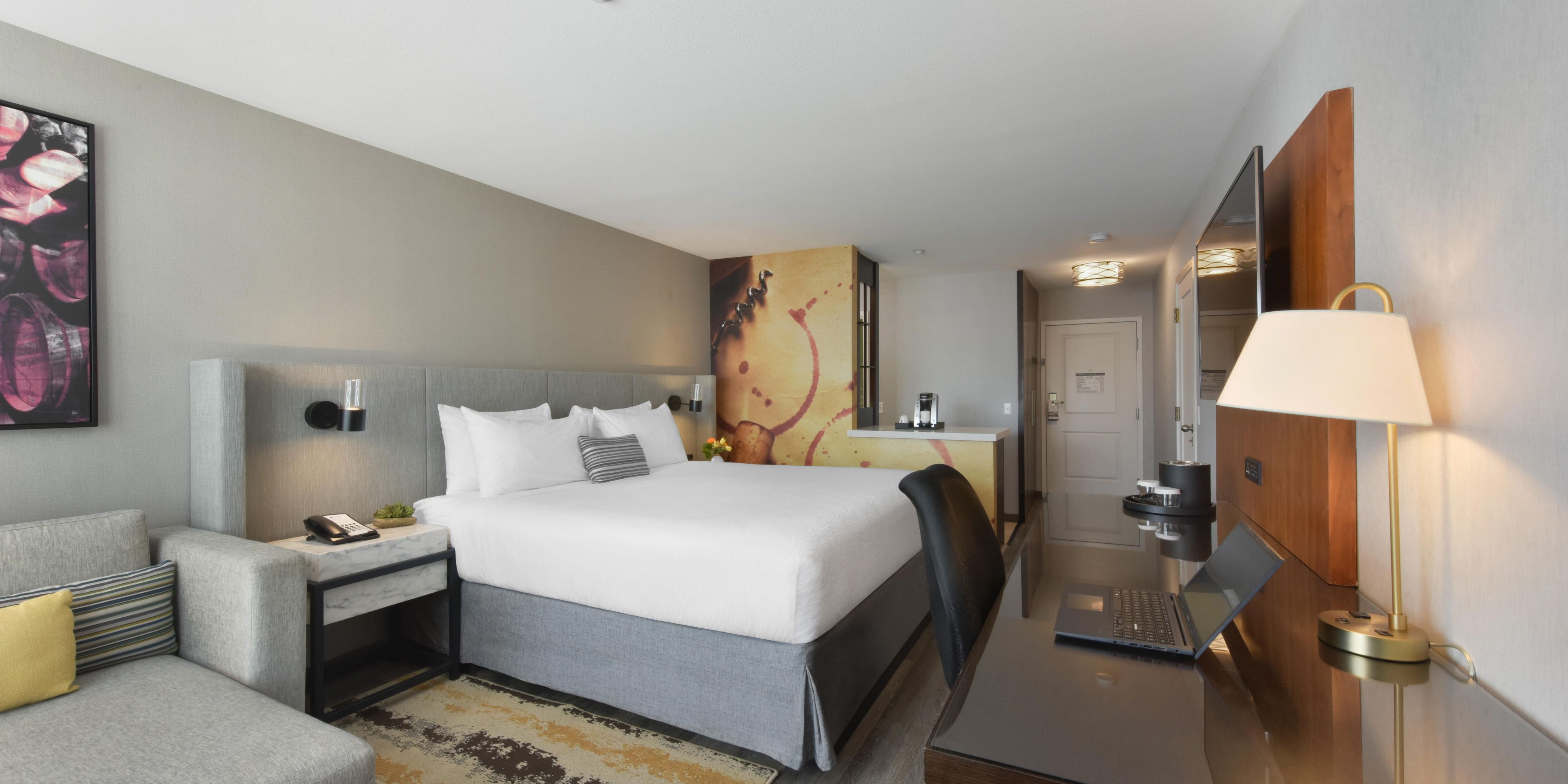 King Bedrooms include king beds, desks, and a lounge area.