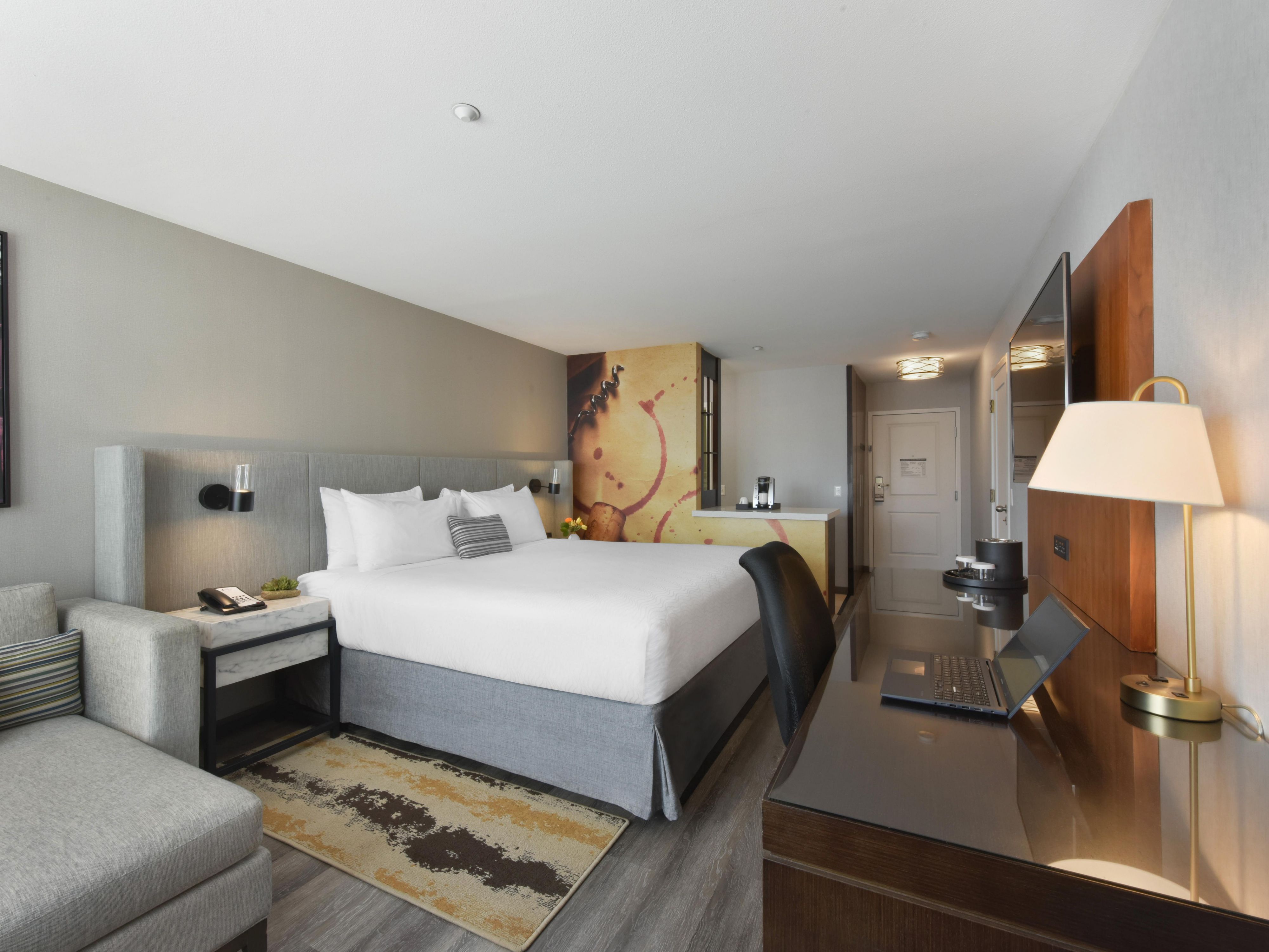 King Bedrooms include king beds, desks, and a lounge area.