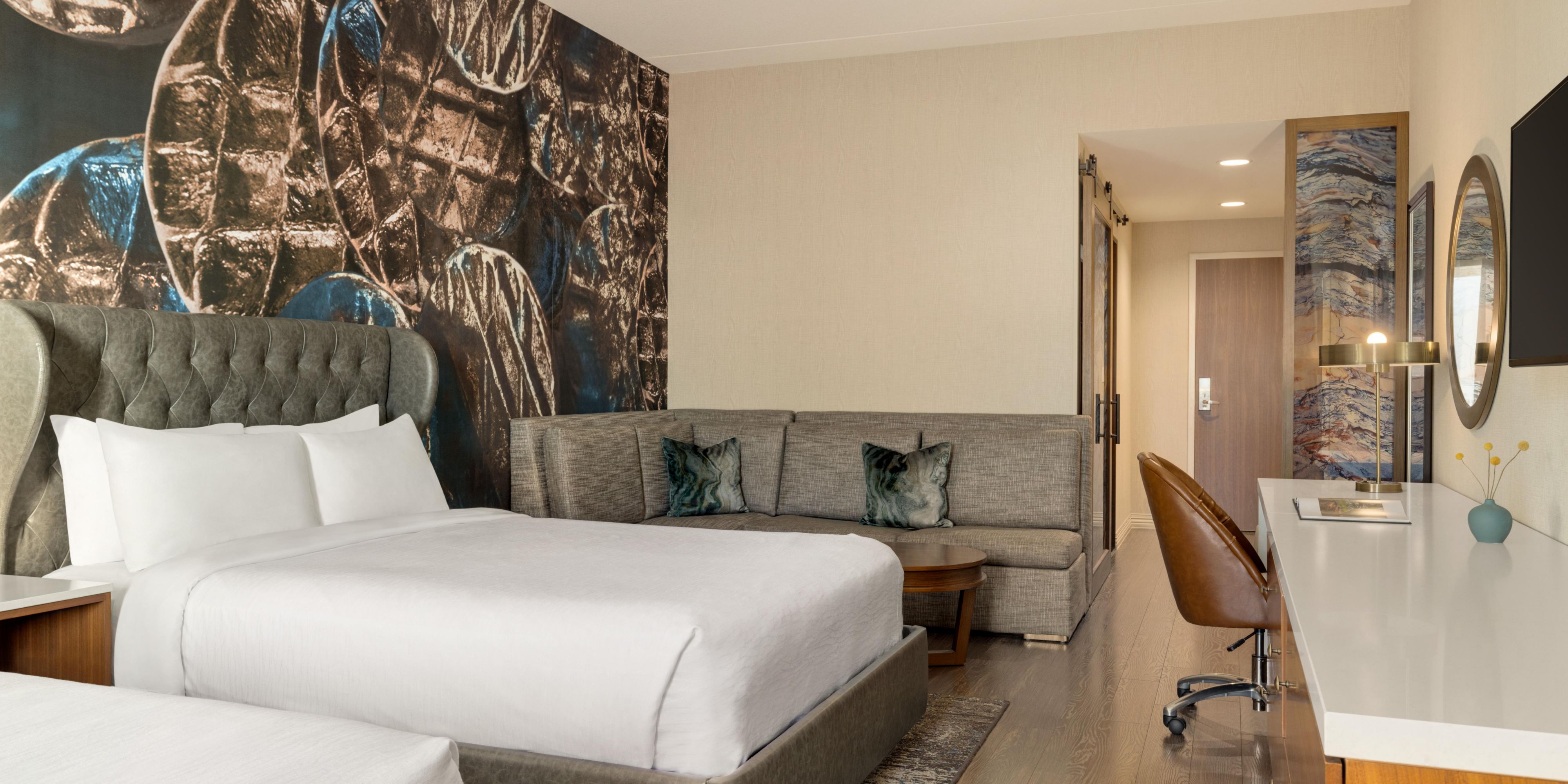 Relax in style in our cozy double queen suite room.