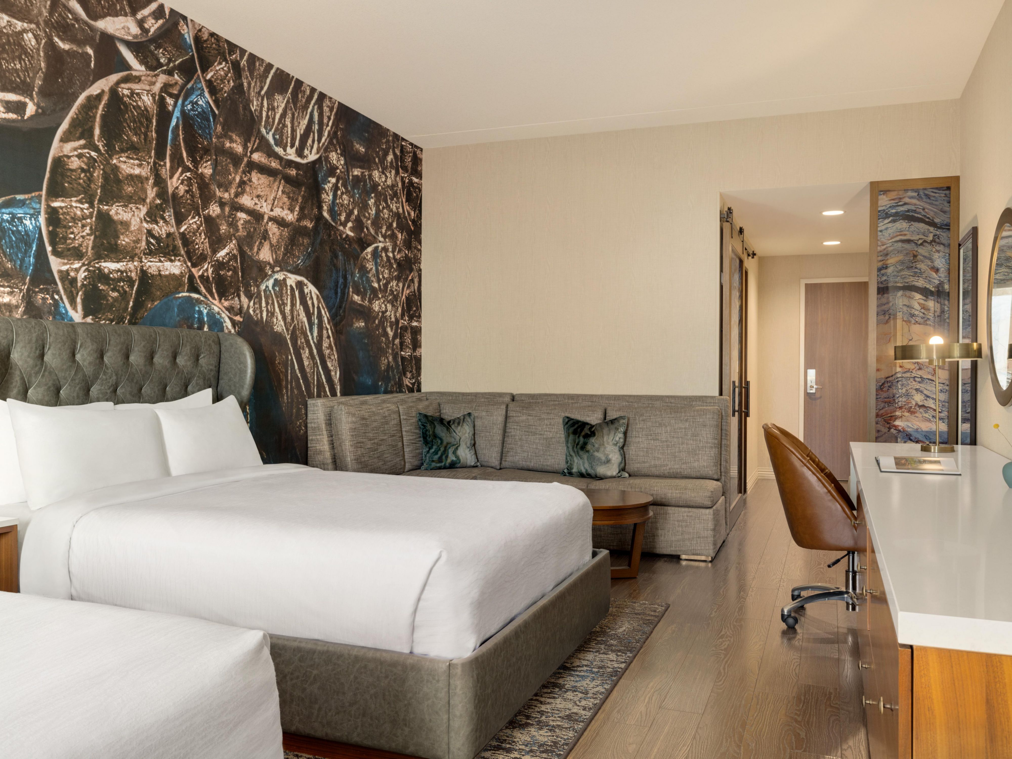 Relax in style in our cozy double queen suite room.
