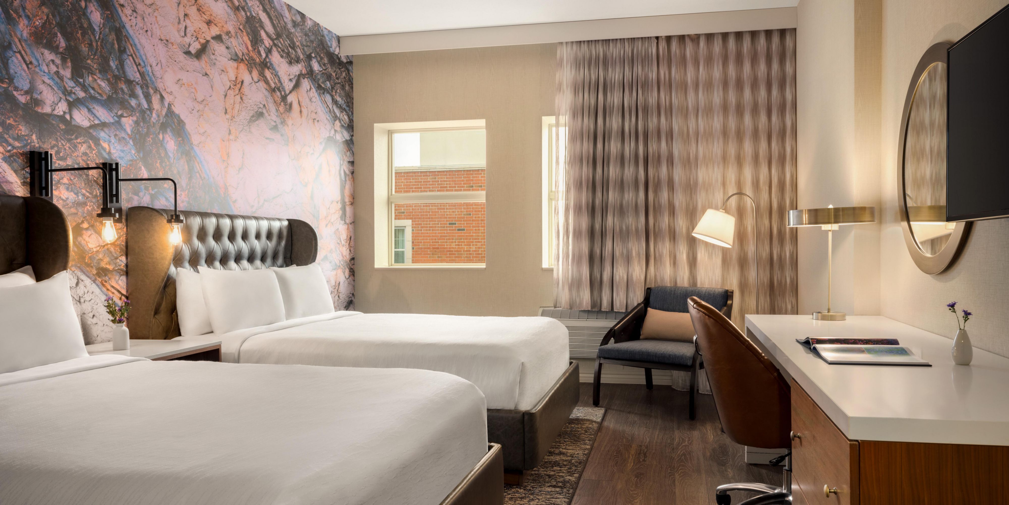 Cozy up in our inviting 2 queen bed standard room.