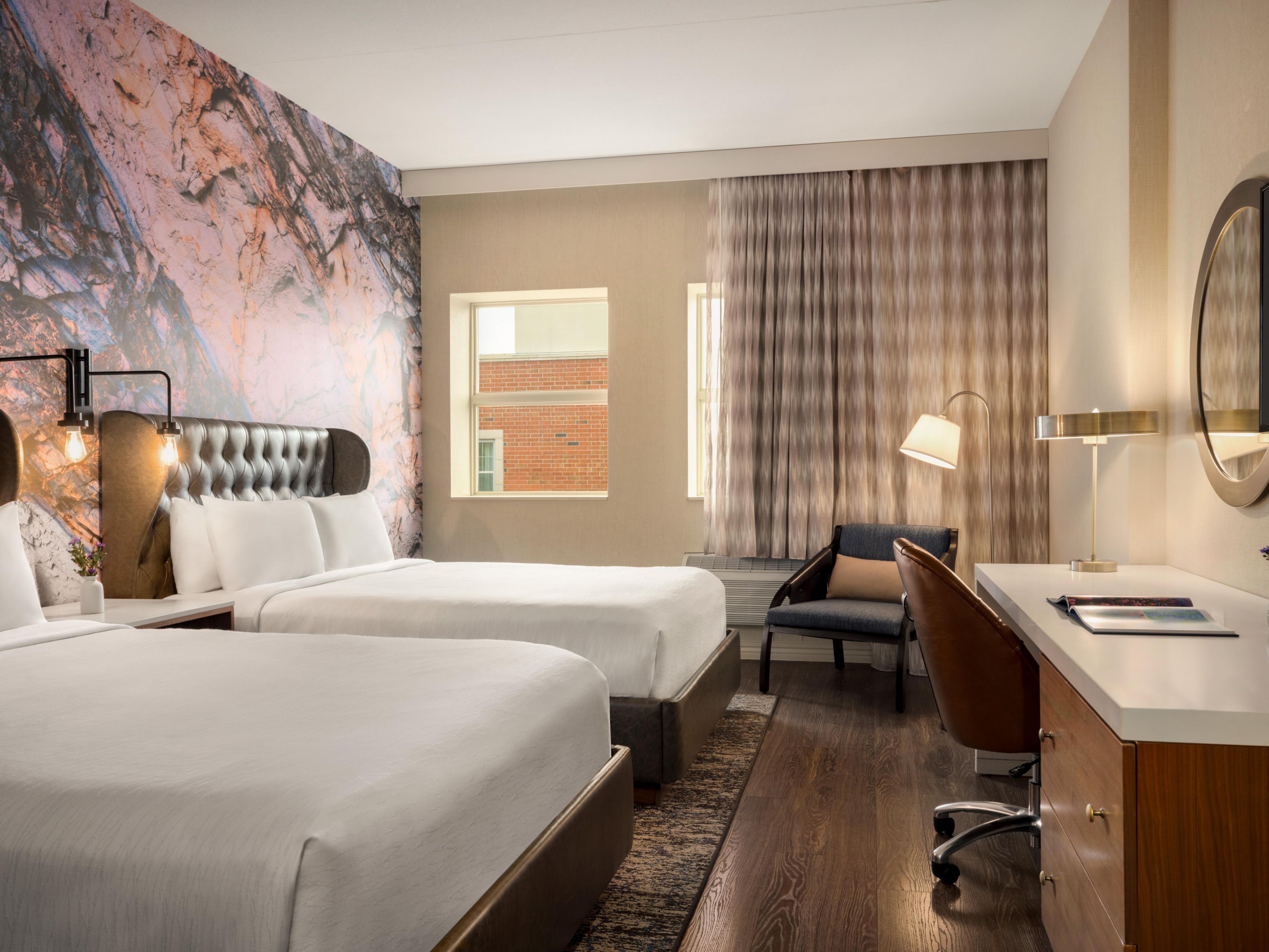 Cozy up in our inviting 2 queen bed standard room.
