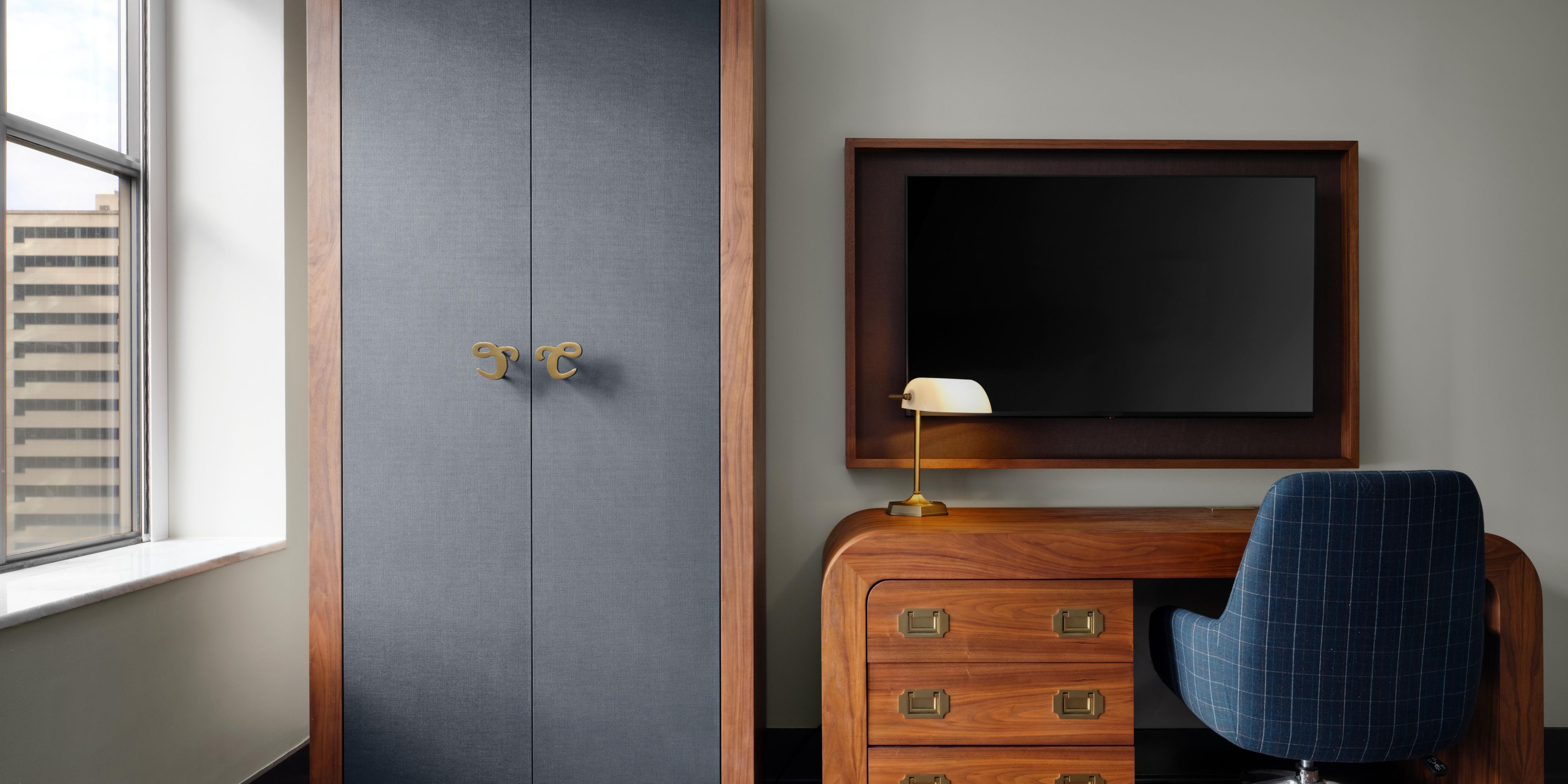 King Guest Room Wardrobe, Workspace, and Flat-Screen TV