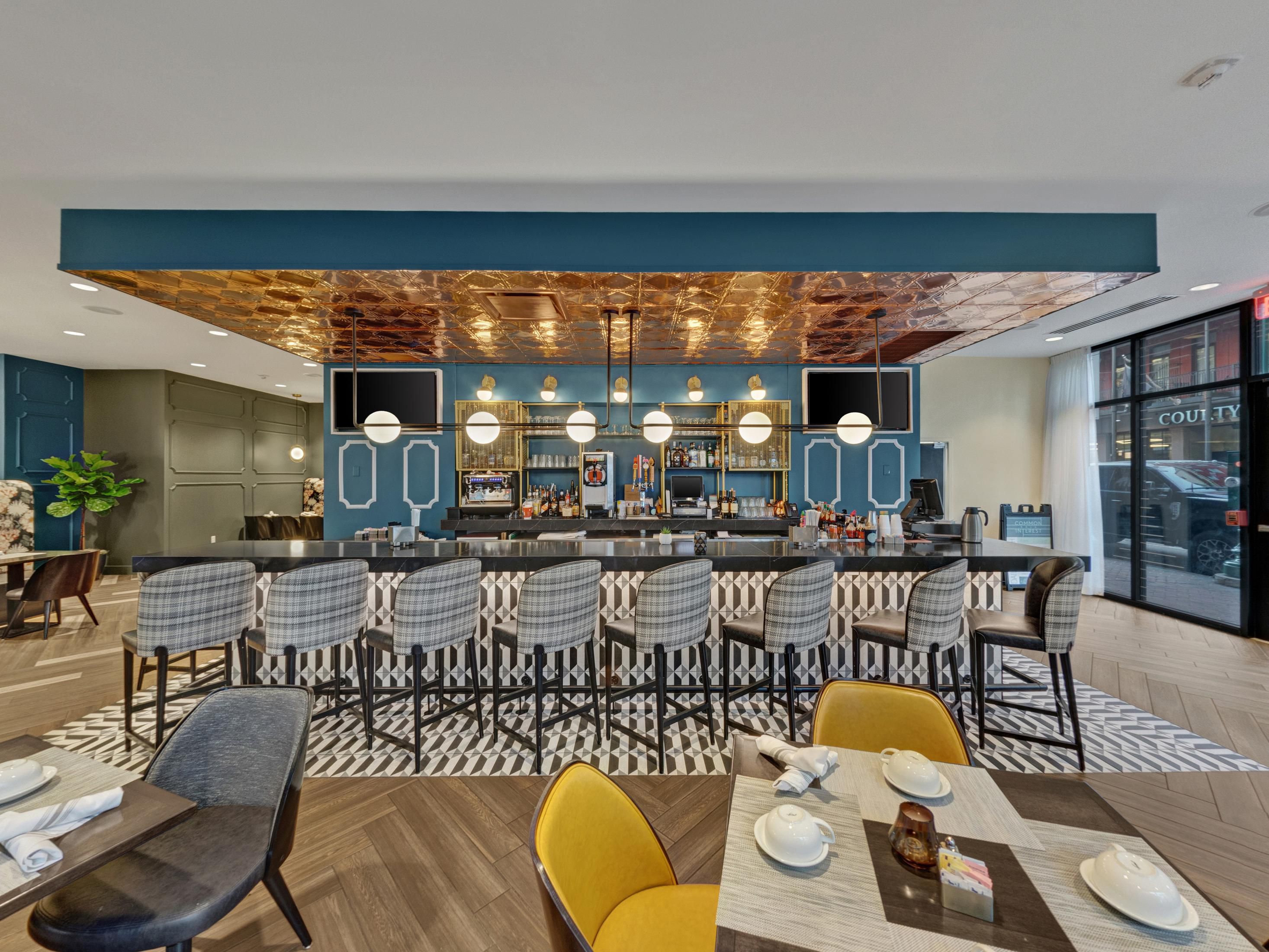 Enjoy a meal in our spacious restaurant, Common Interest.