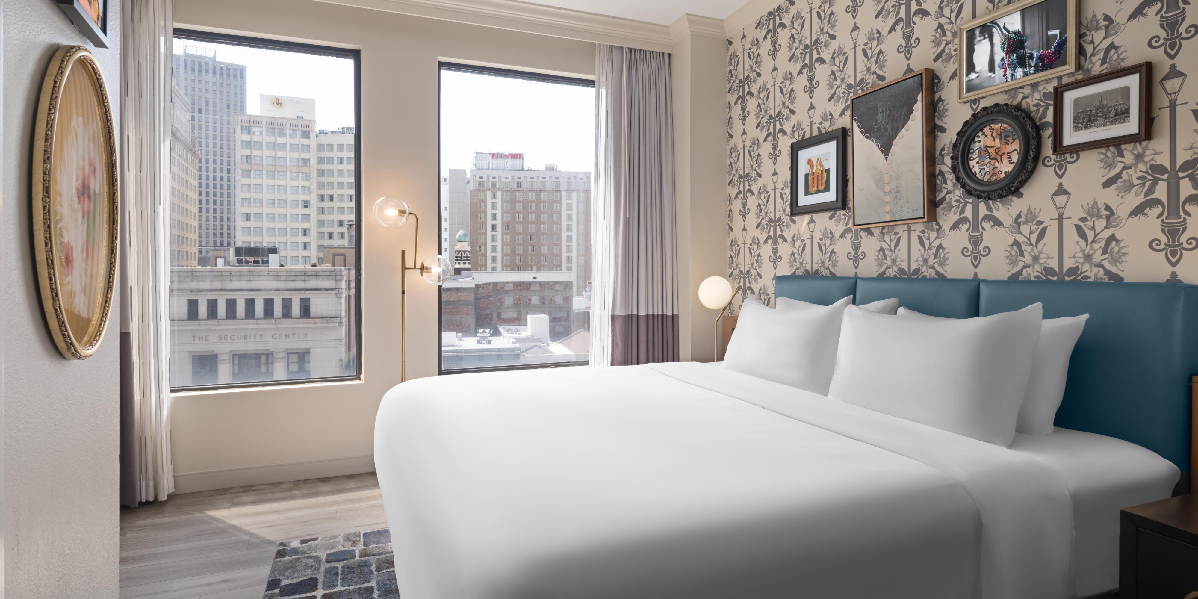 Wake up to stunning city views from our chic guestrooms.
