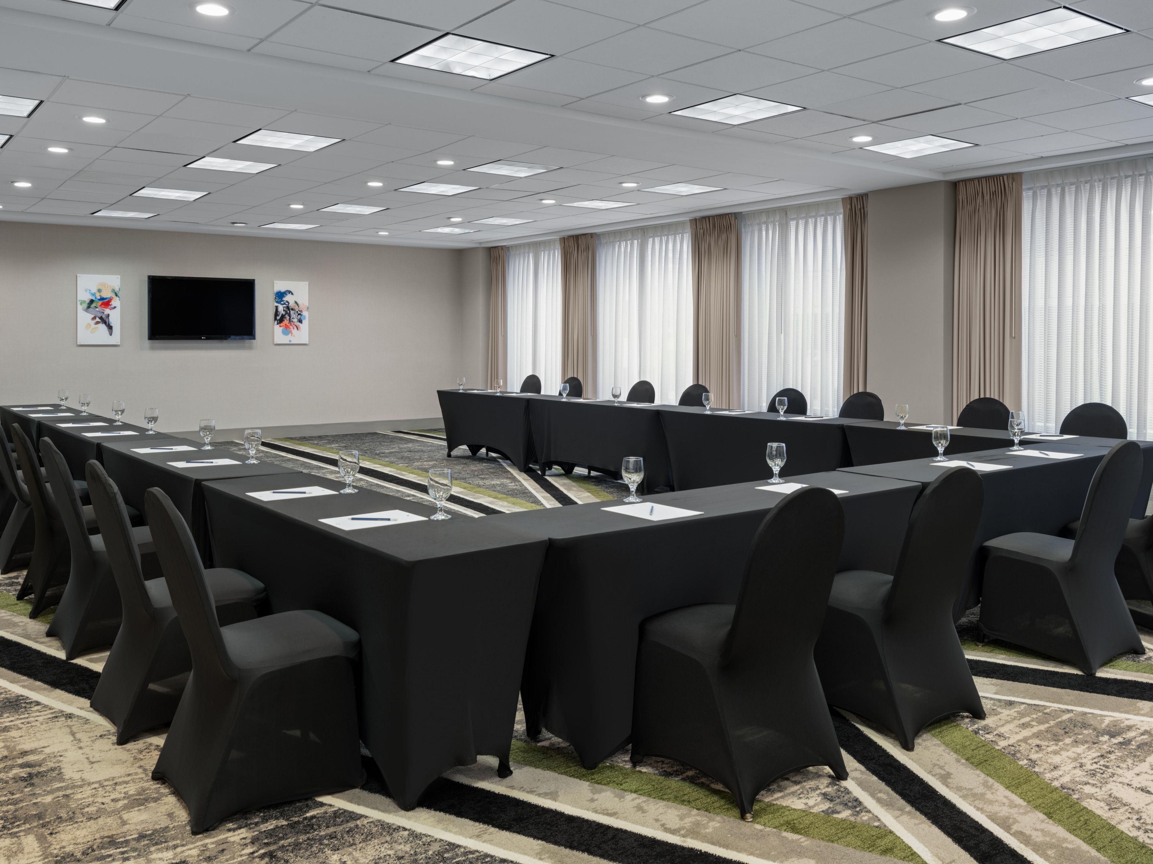Meeting room with u-shaped tables