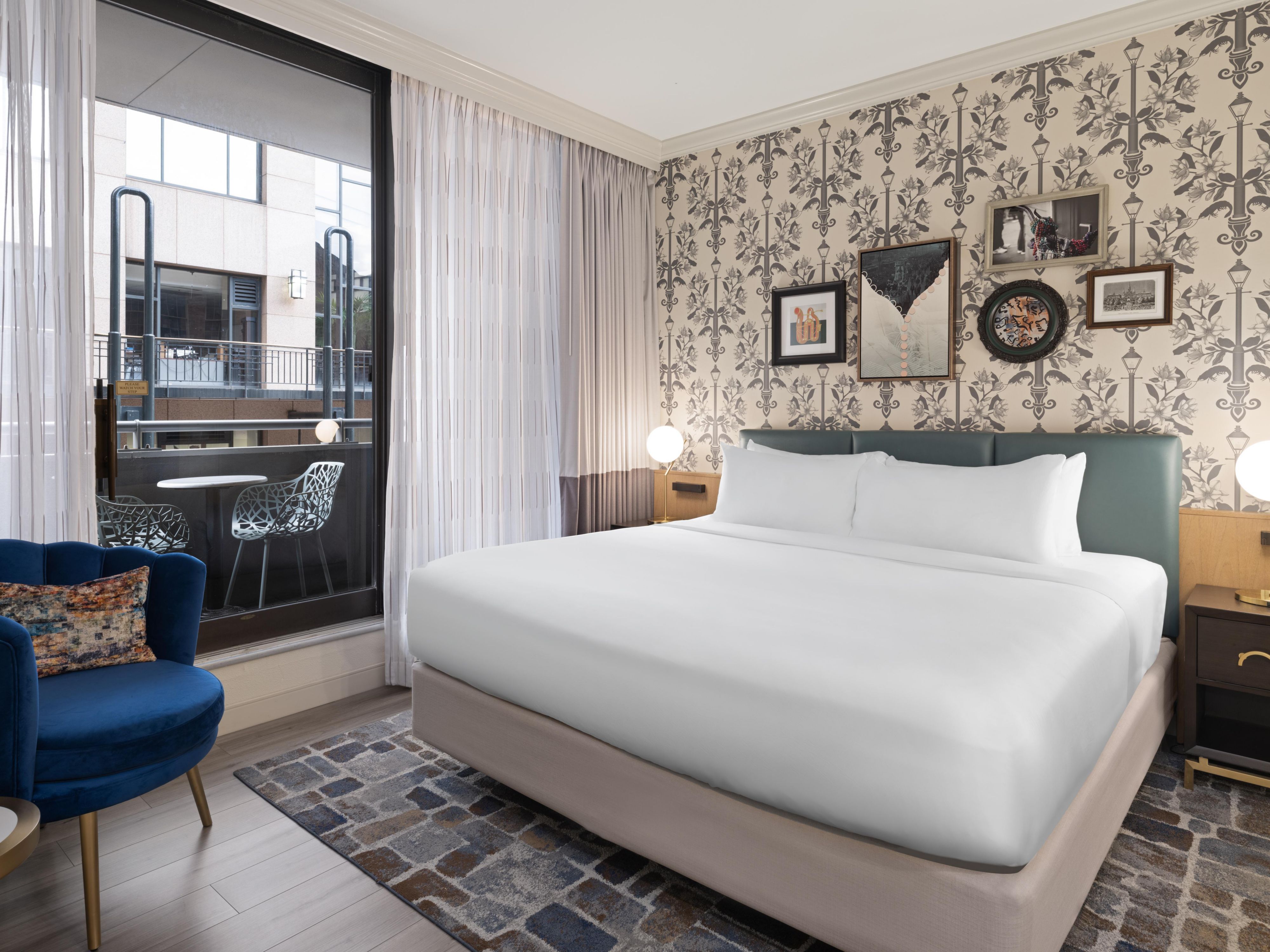 Sleep in comfort with our plush king bed at Hotel Indigo.