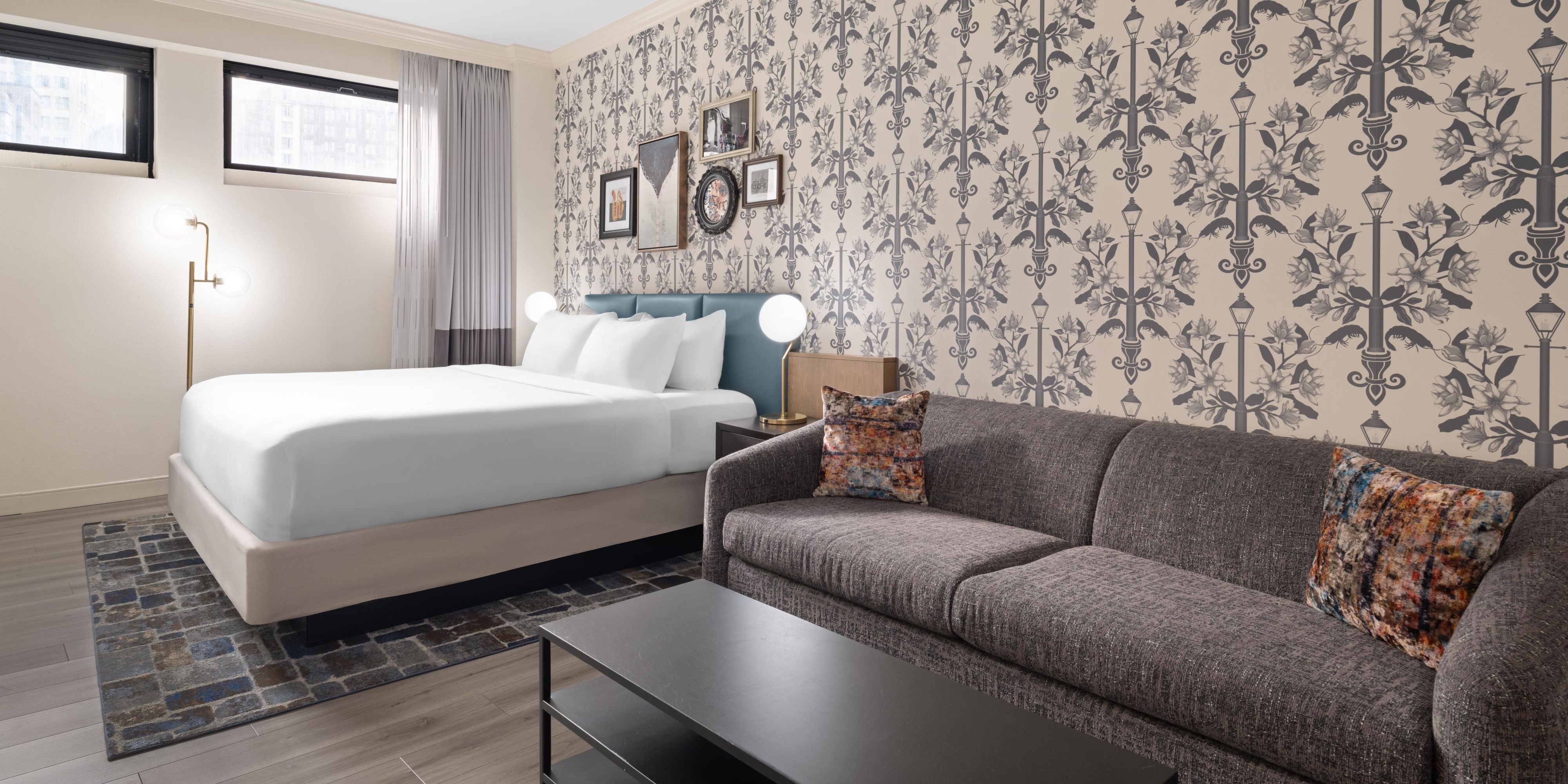 Relax in our premium king with a cozy bed & inviting sitting area.