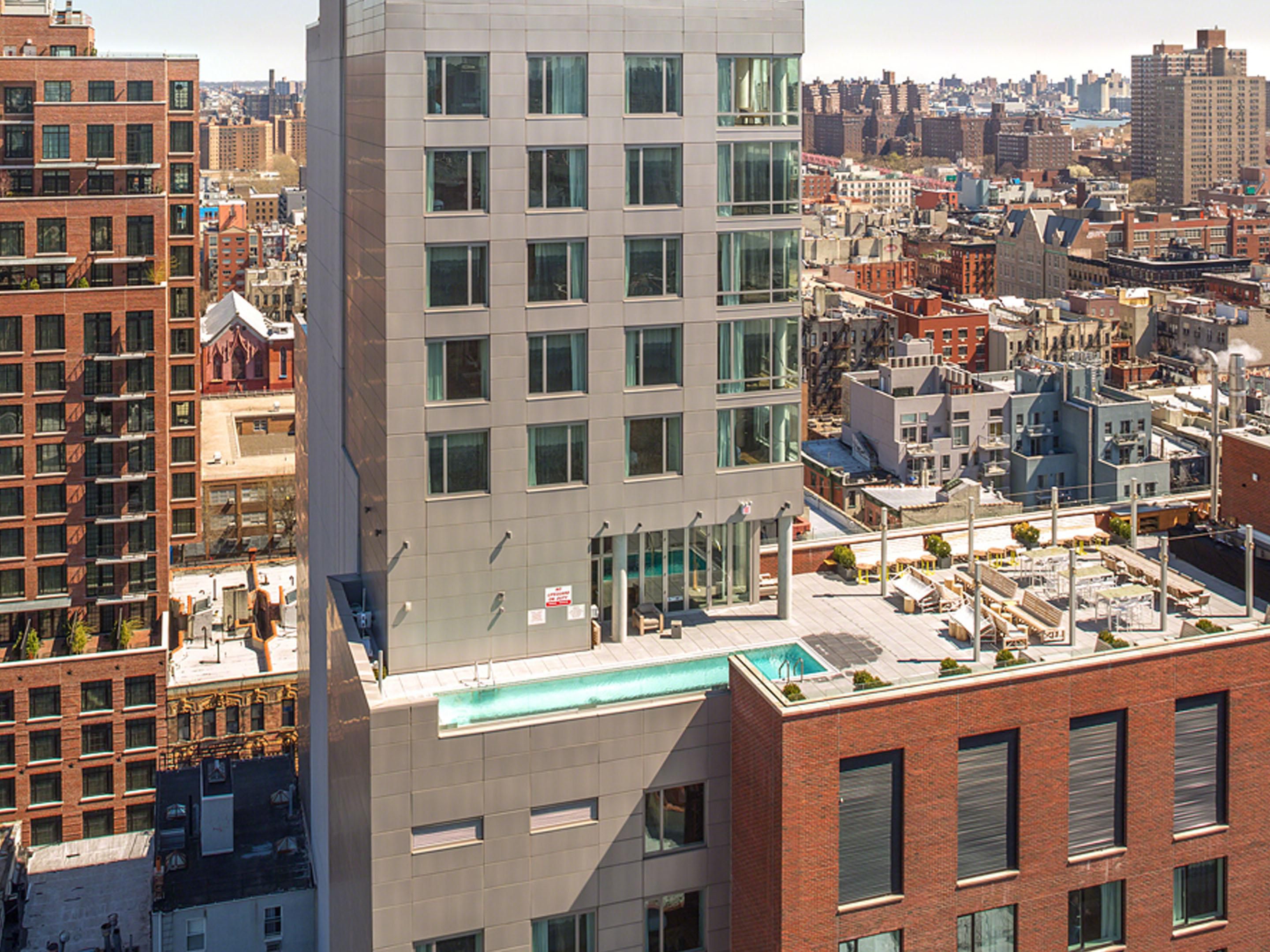 Enjoy a view of the city while taking a dip in our rooftop pool.