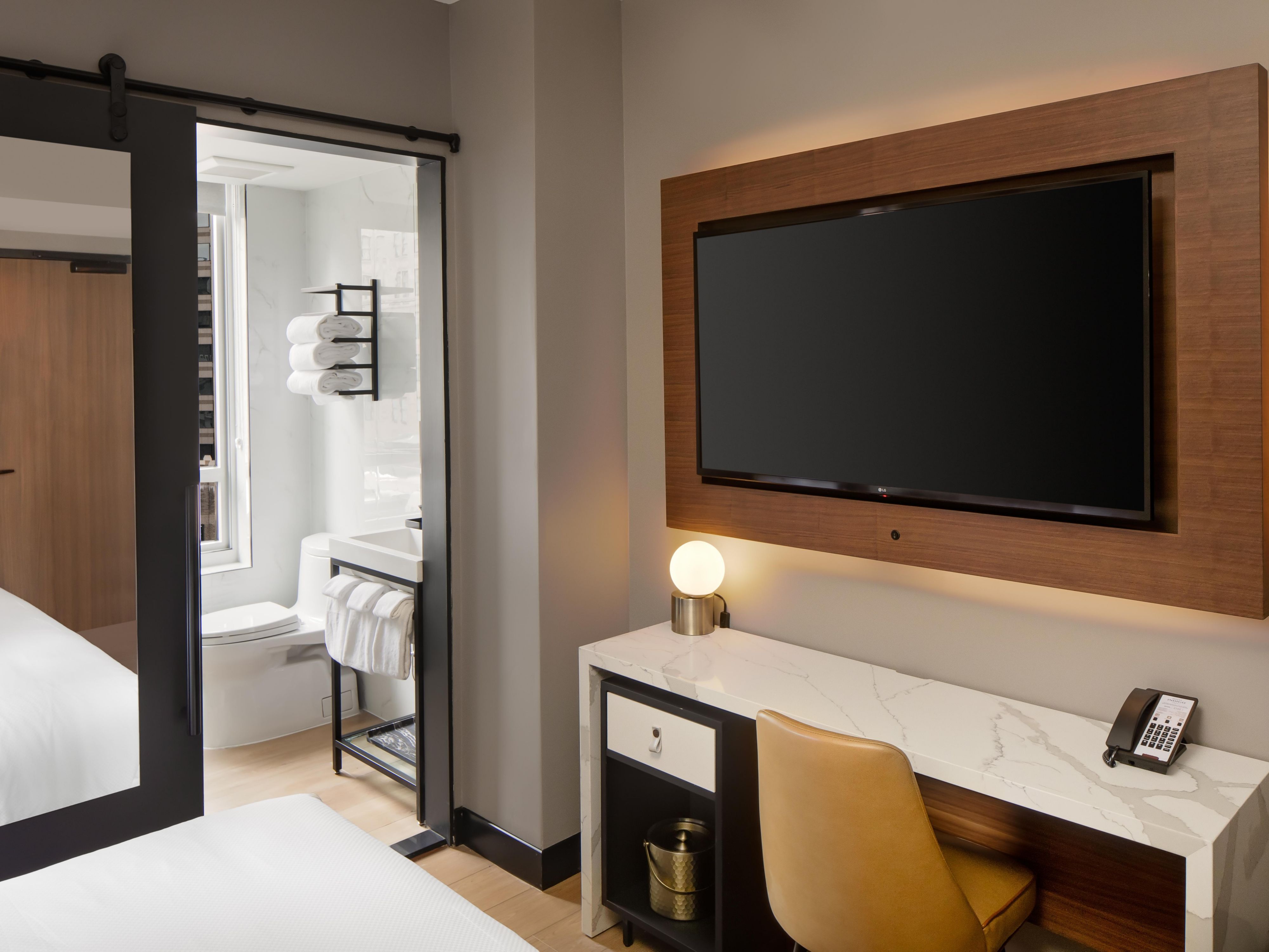 Experience home-like comfort with a white marble desk.