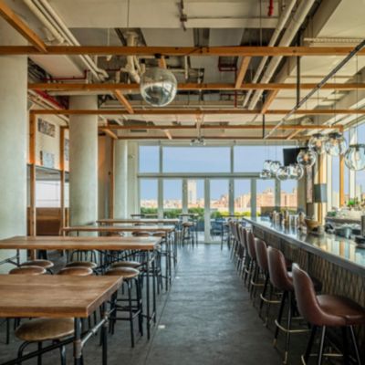 Order your favorite cocktail at Mr. Purple Rooftop Bar.