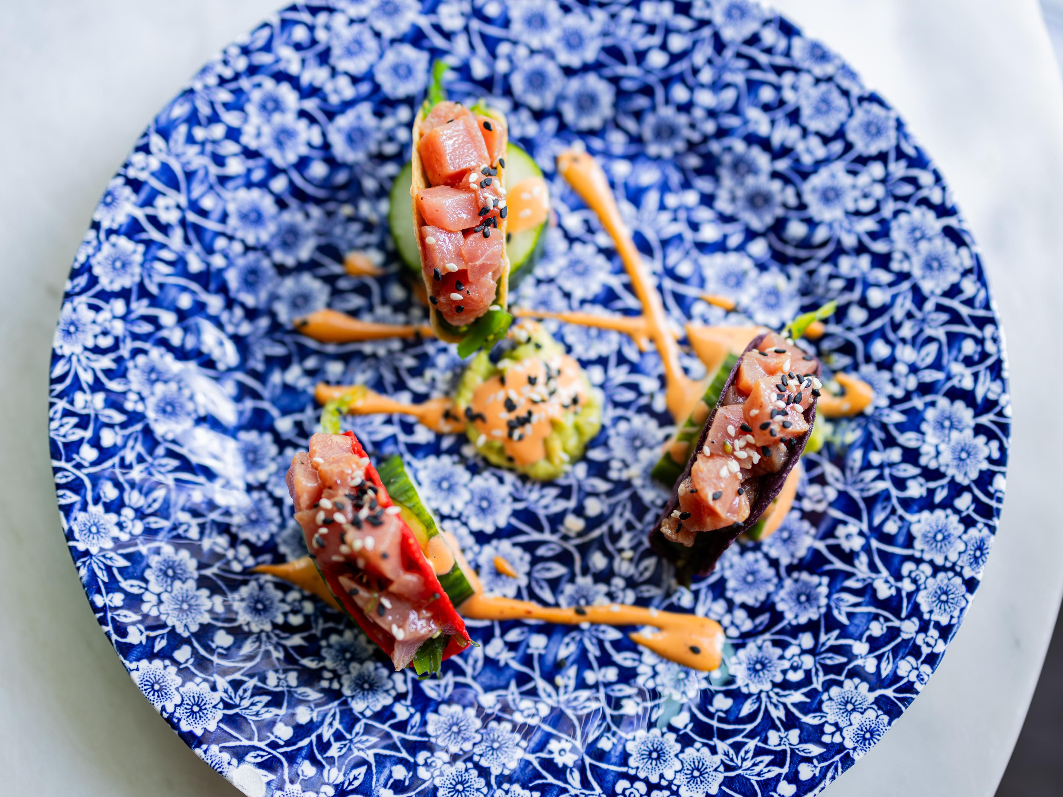 Order the Tuna appetizer at Highwater Rooftop.