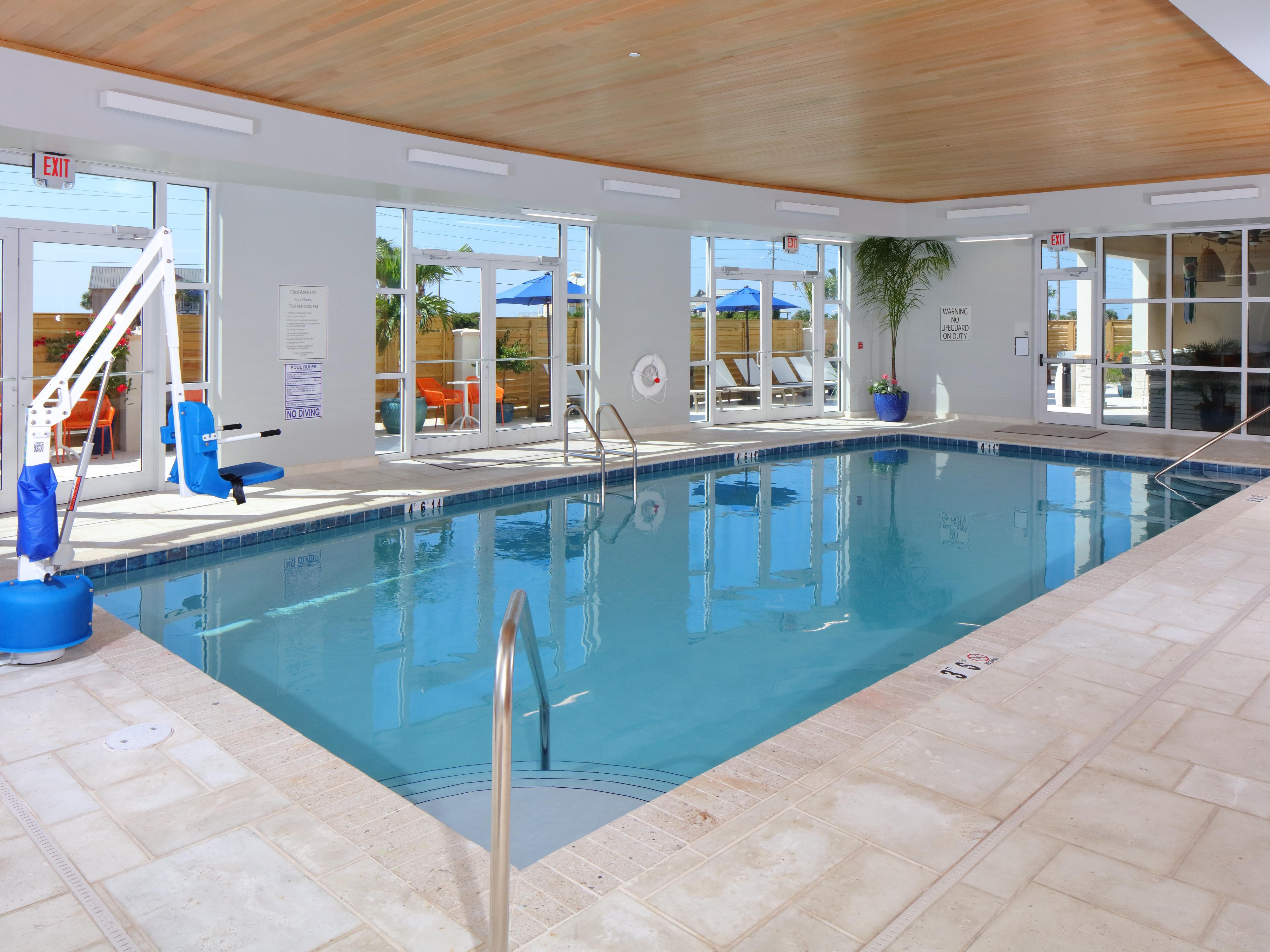 Enjoy our indoor heated pool with views of the Courtyard area