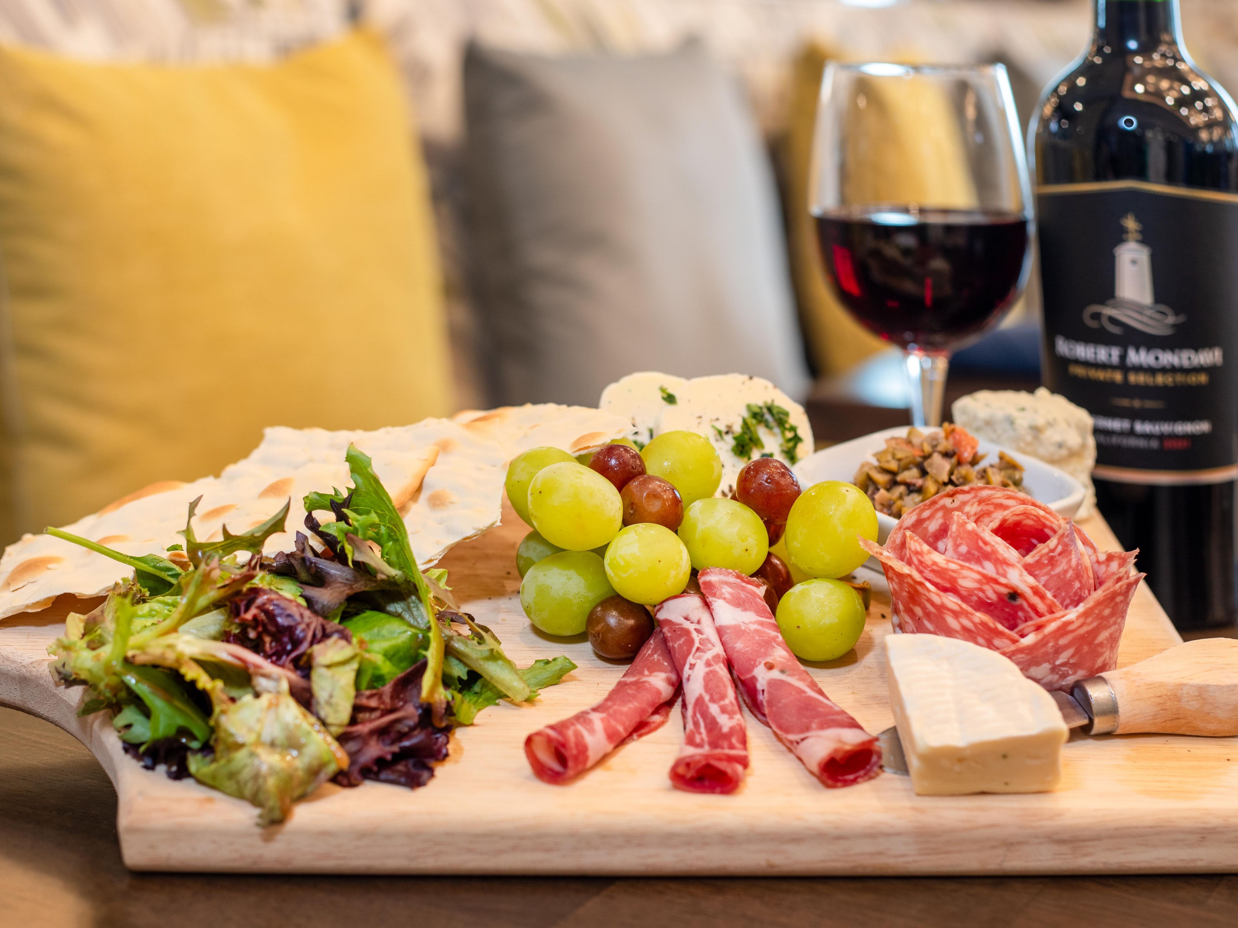 charcuterie board and wine