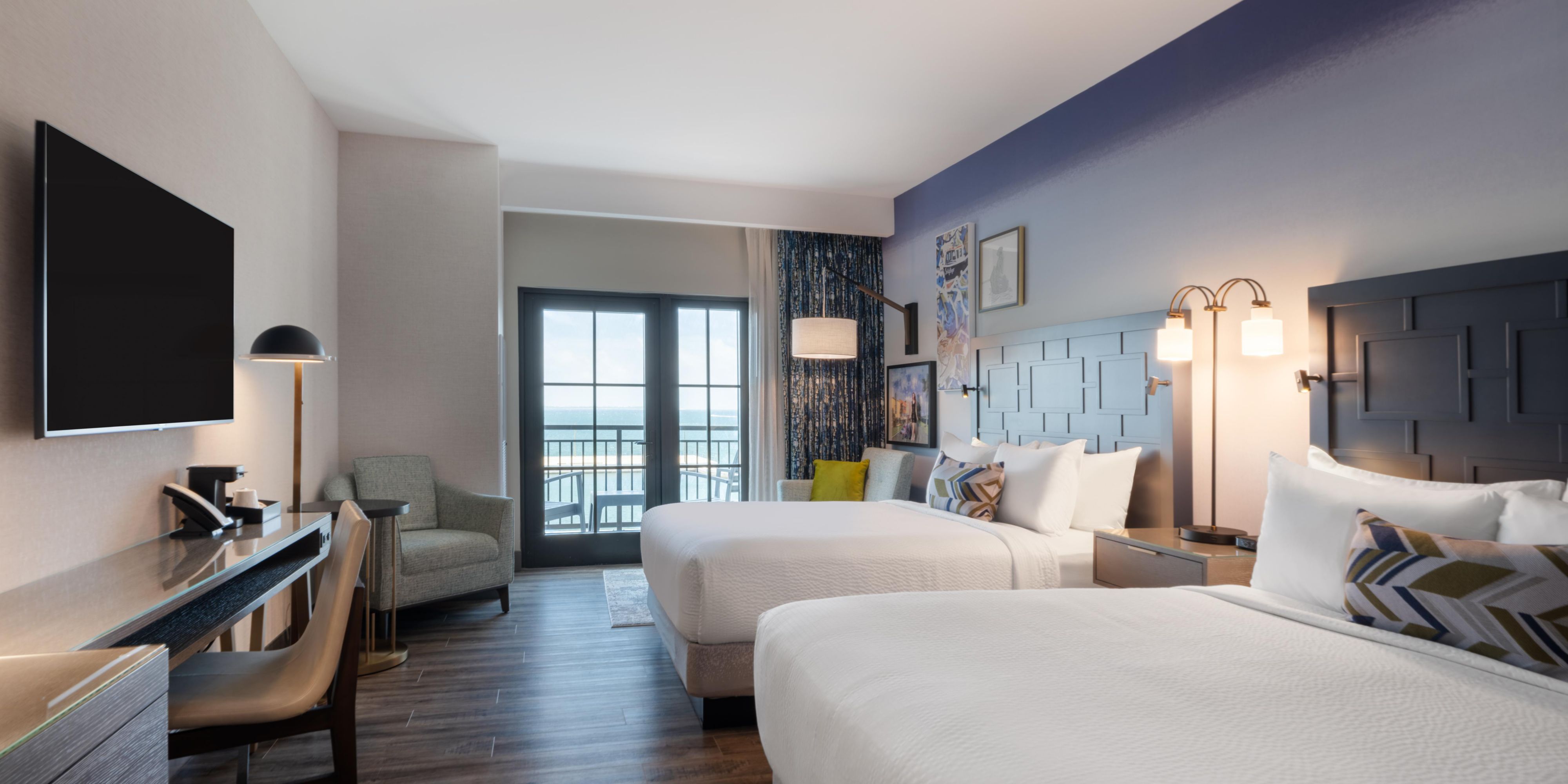 Premium rooms offer two beds and balcony with views.