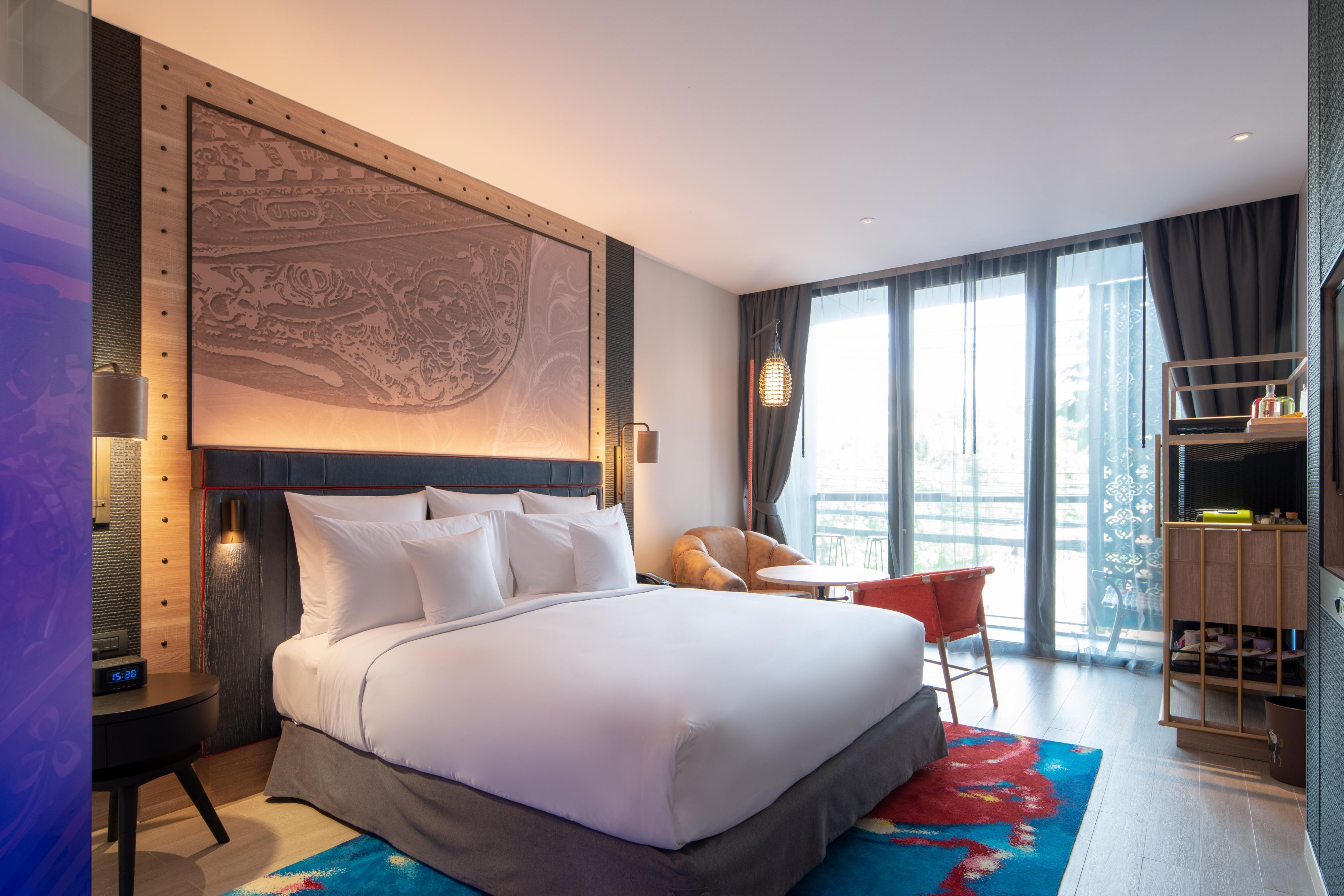 Our North Patong boutique hotel features 180 stylishly designed rooms, each drawing inspiration from Patong's tropical forests, lively neon lights, and the rich heritage of a fishing village. Our spacious accommodations offer a seamless blend of comfort and style, immersing you in the unique and dynamic atmosphere of this captivating destination.
