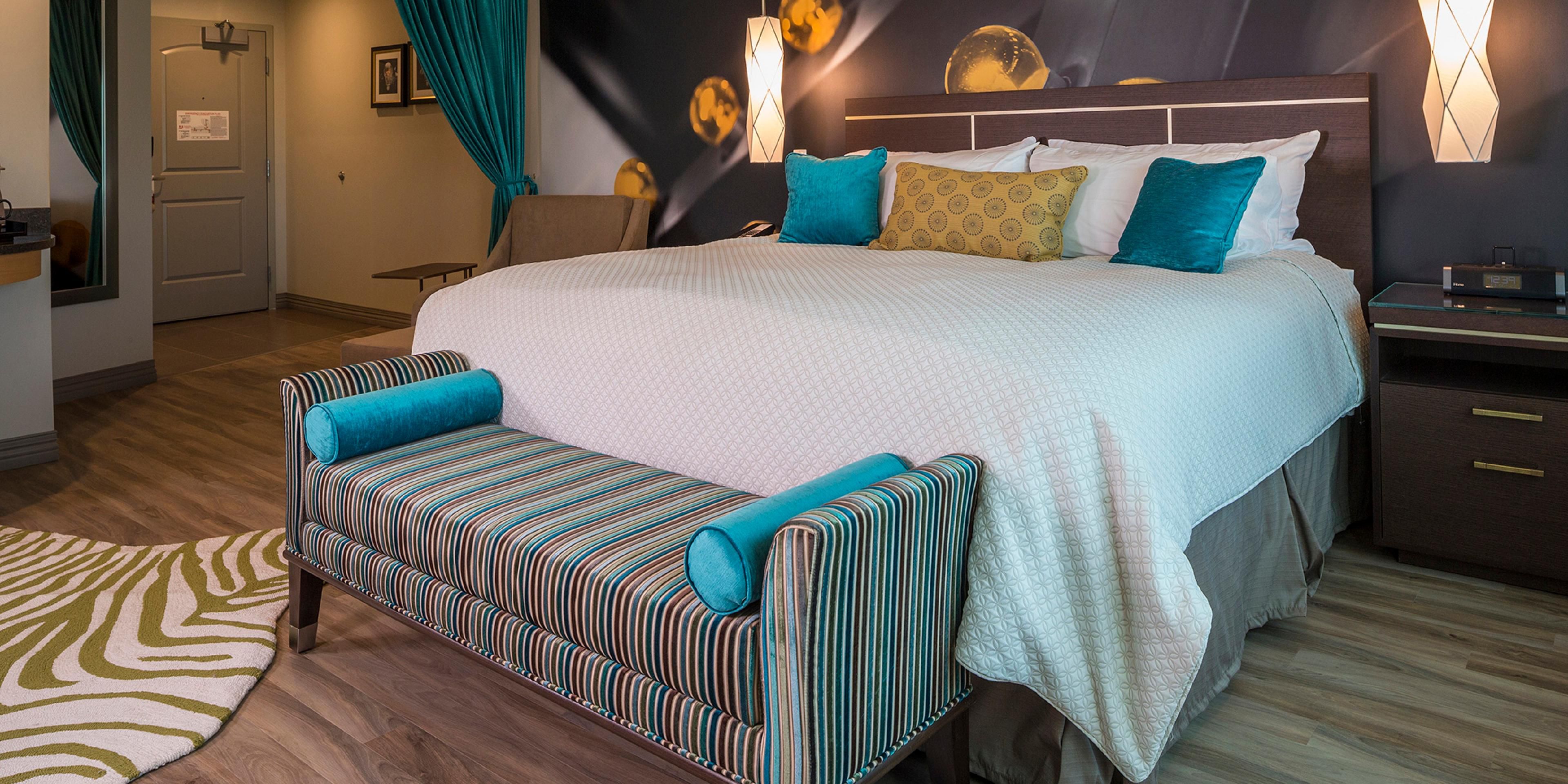 King Standard room offers plush bedding and ample space to relax