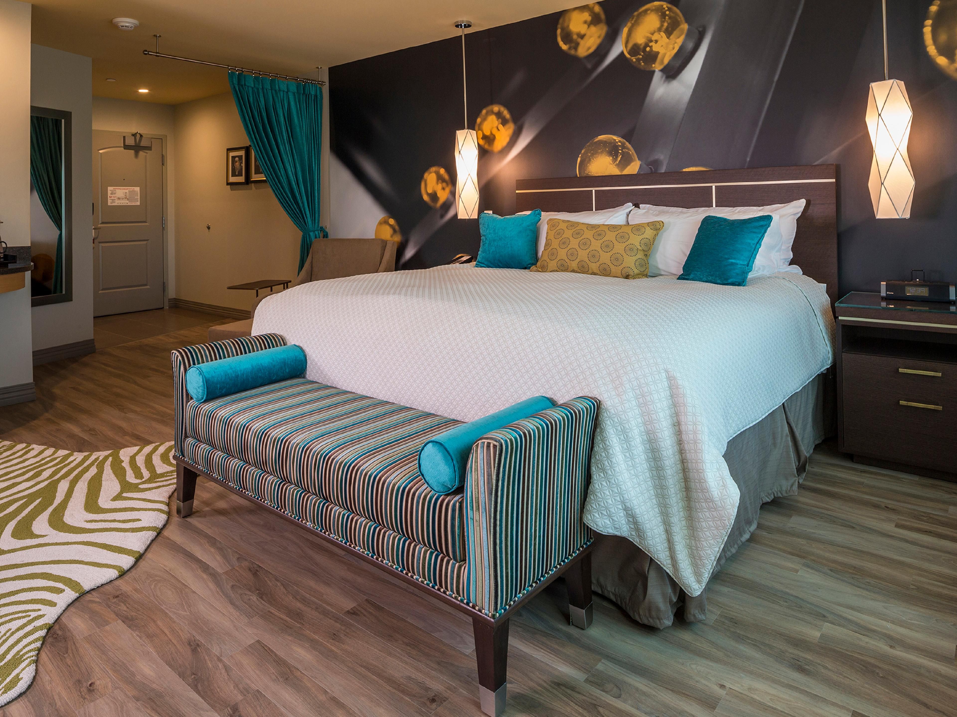 King Standard room offers plush bedding and ample space to relax