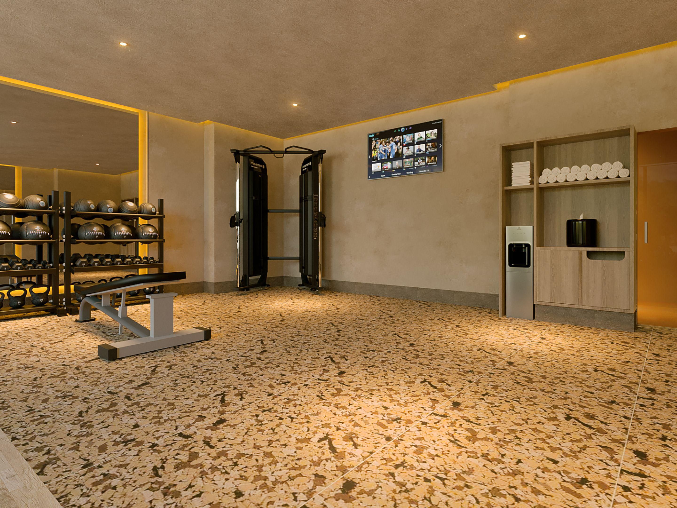 Our modern fitness center is located on the lower level, featuring floor-to-ceiling windows with vibrant street views. Equipped with cardio machines, free weights, and stretching space, it offers a bright, energizing atmosphere for guests to stay active during their stay.