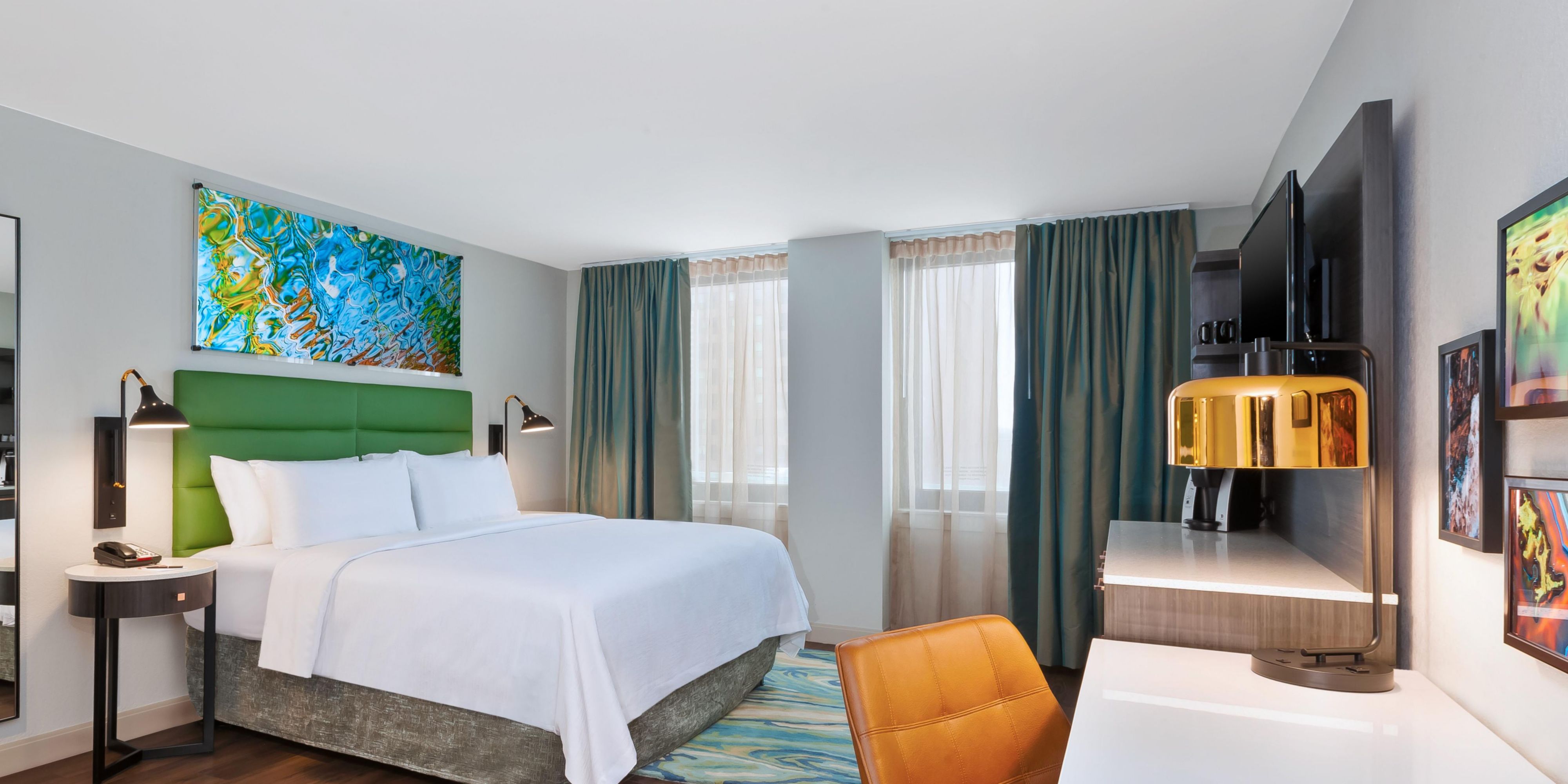 Unwind in our spacious King Deluxe rooms with premium bedding.