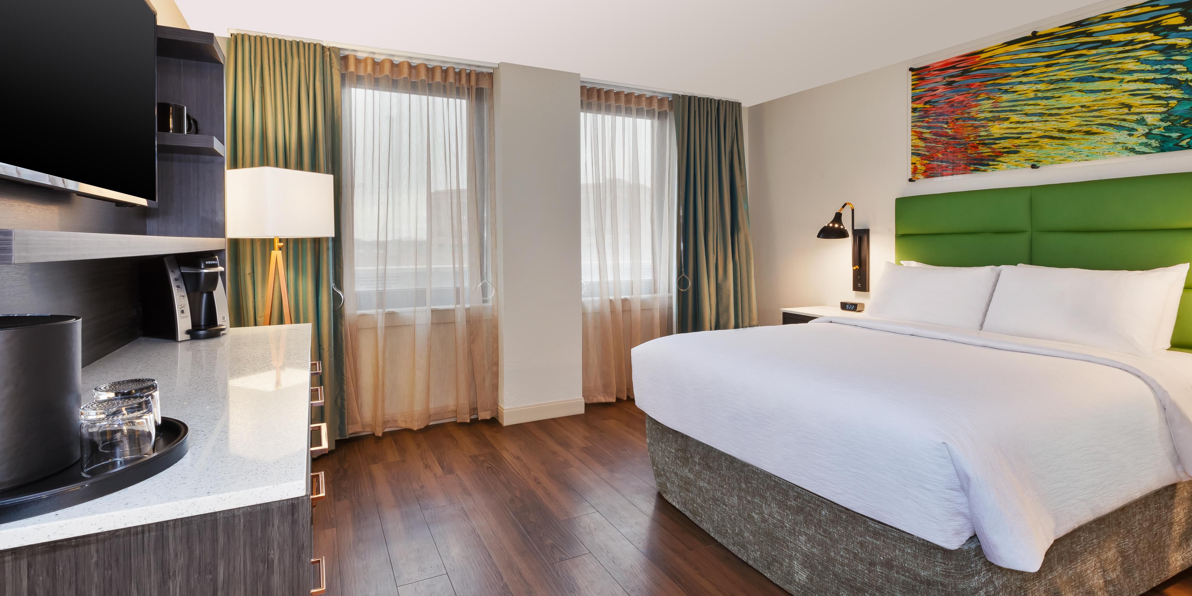 Relax in our queen standard room with upscale amenities.