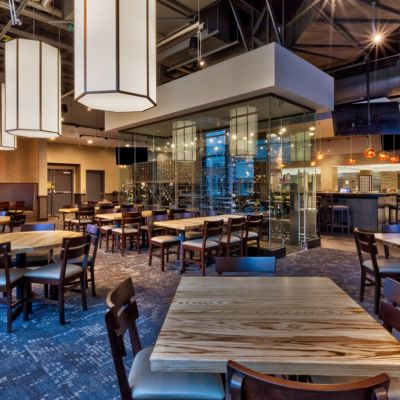 Savor delicious meals in an open-air space with retractable roof.