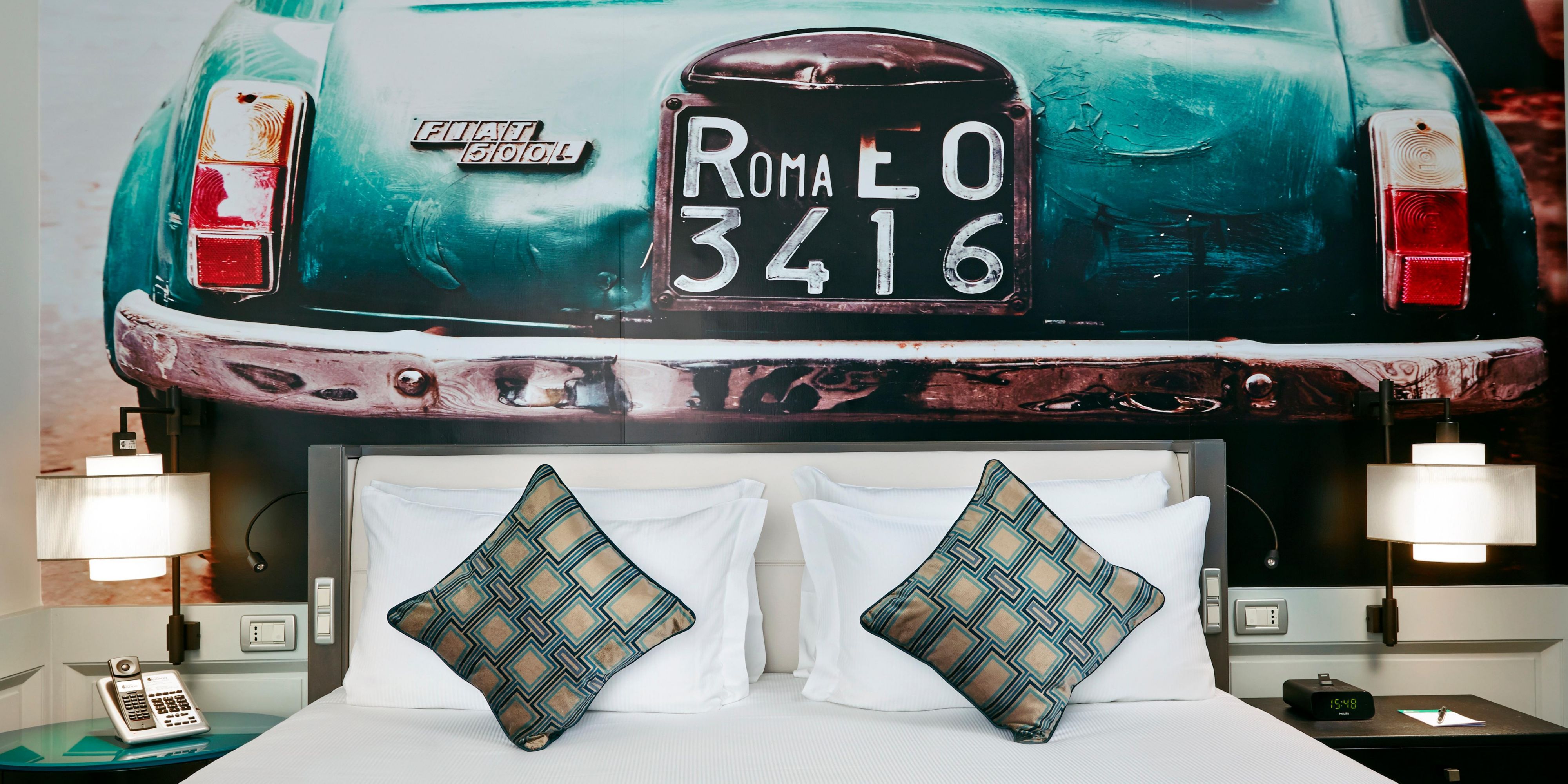 The stylish Premium Room features the iconic FIAT 500