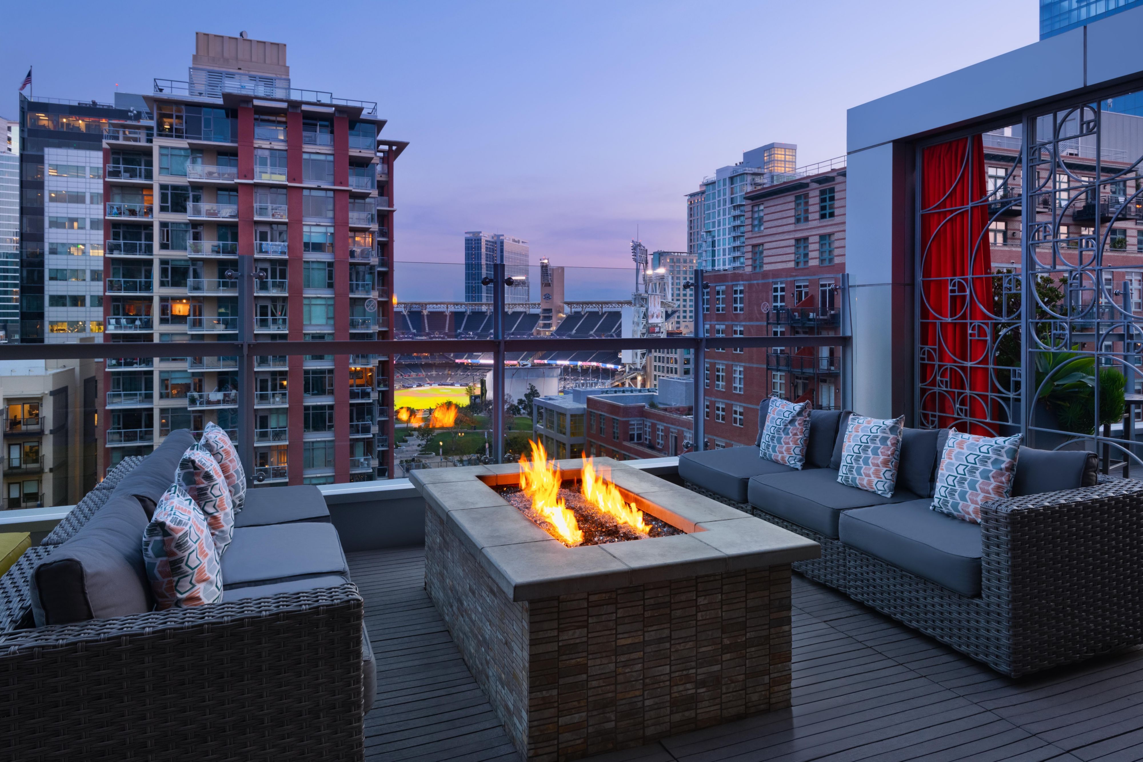 Located on the 9th floor overlooking Petco Park in the East Village Neighborhood, our Level 9 Rooftop bar features fire-pit seating with scenic views of the San Diego Skyline and colorful sunsets. It is a local favorite for its cocktails and dog-friendly staff.
