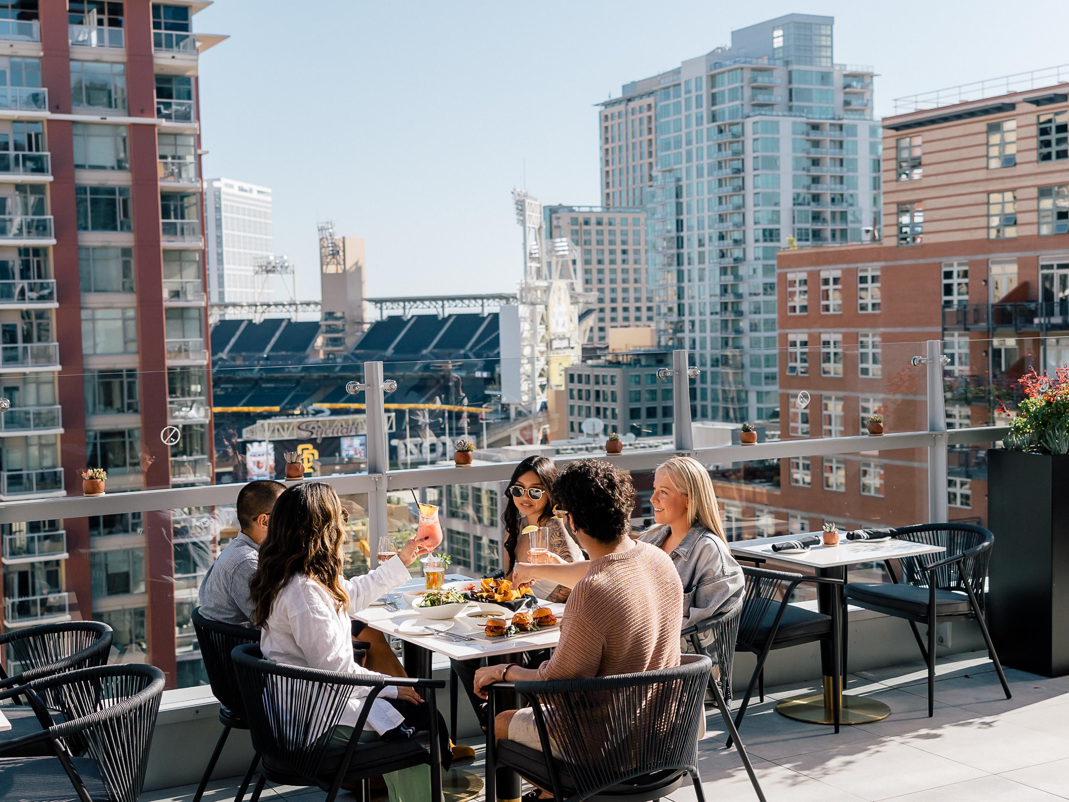 friends hanging out on Boreggo Rooftop