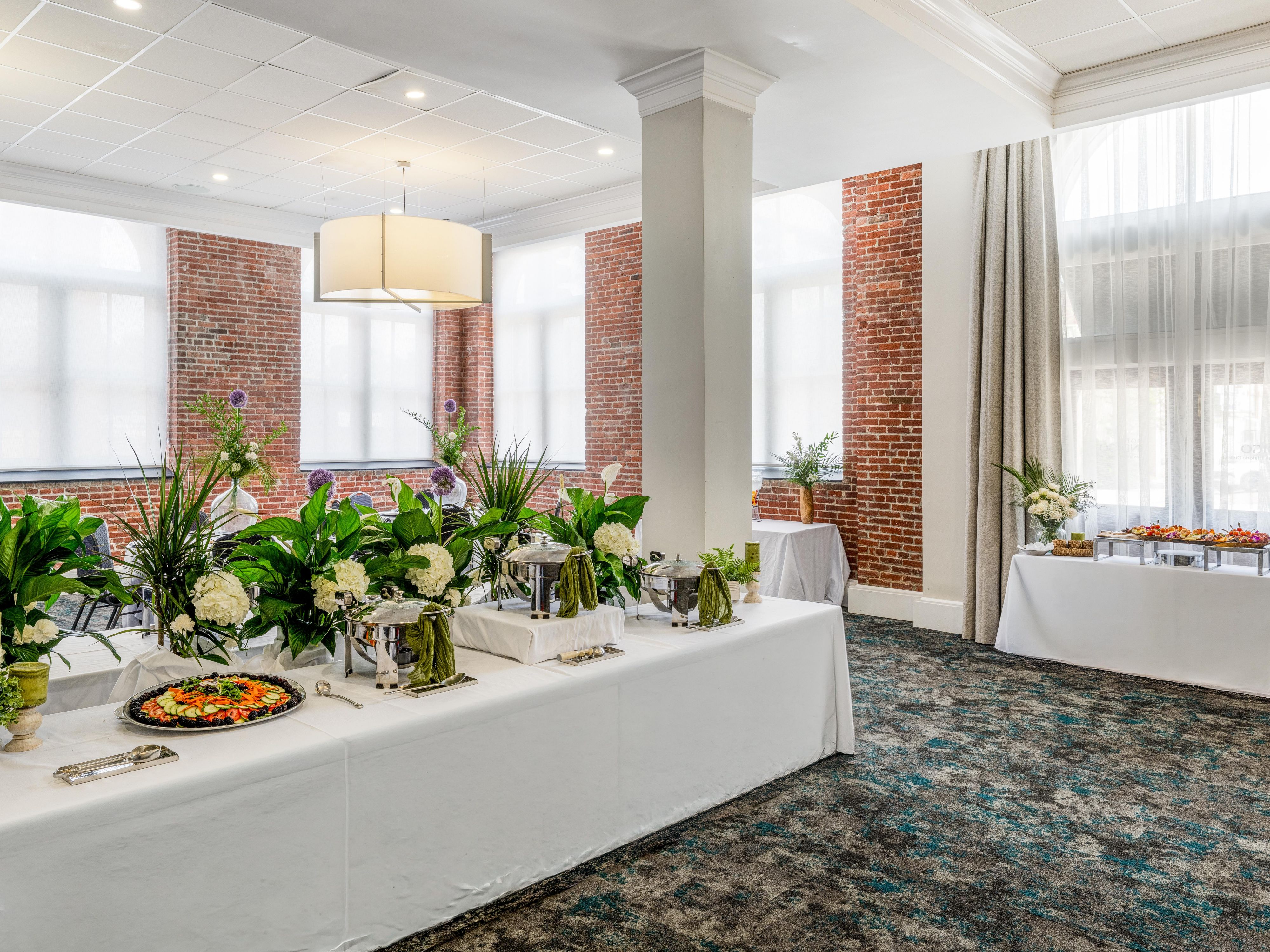 Gather for a buffet beside the windows.