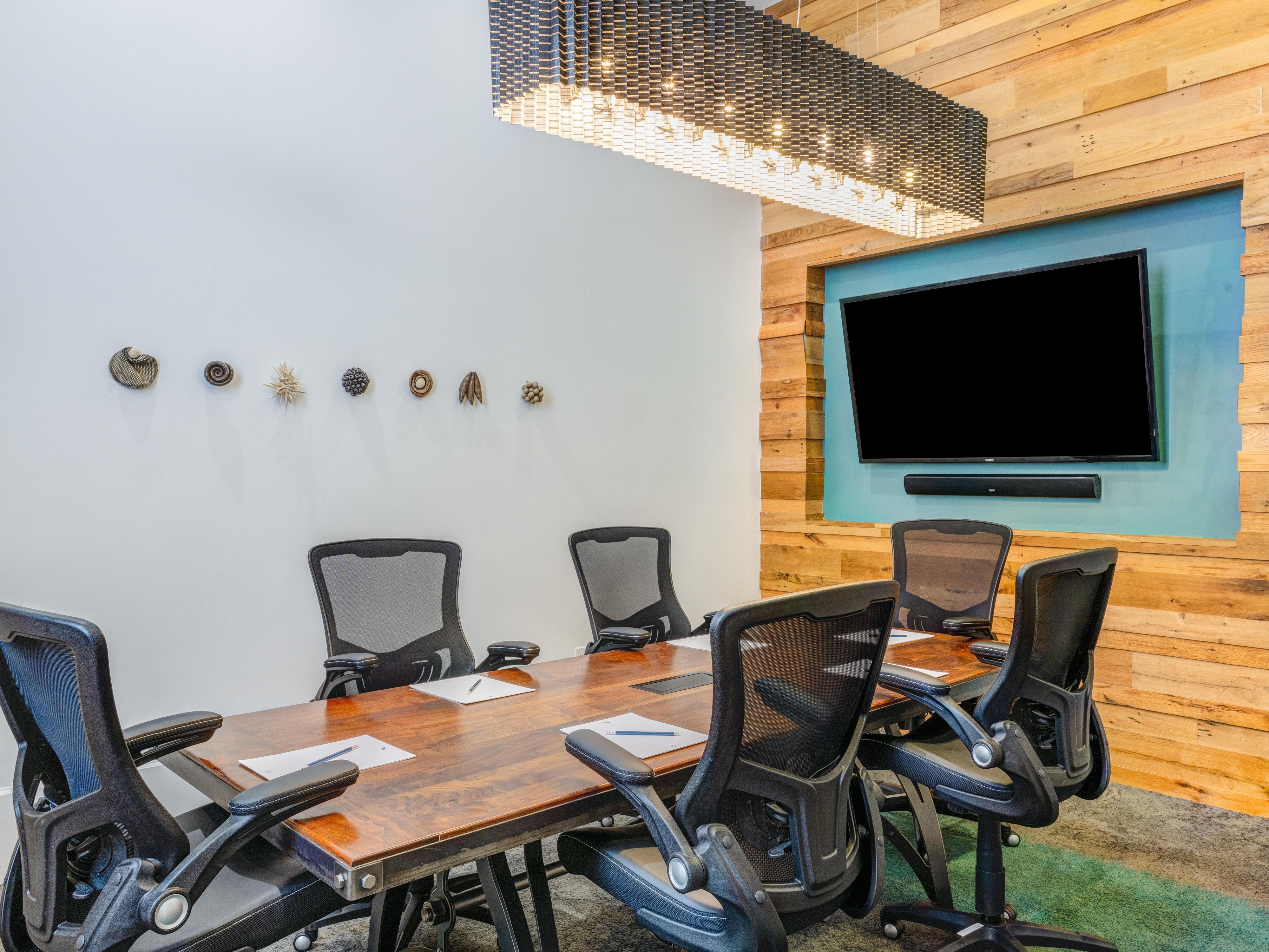 Present to your team using our boardroom's wall-mounted TV.