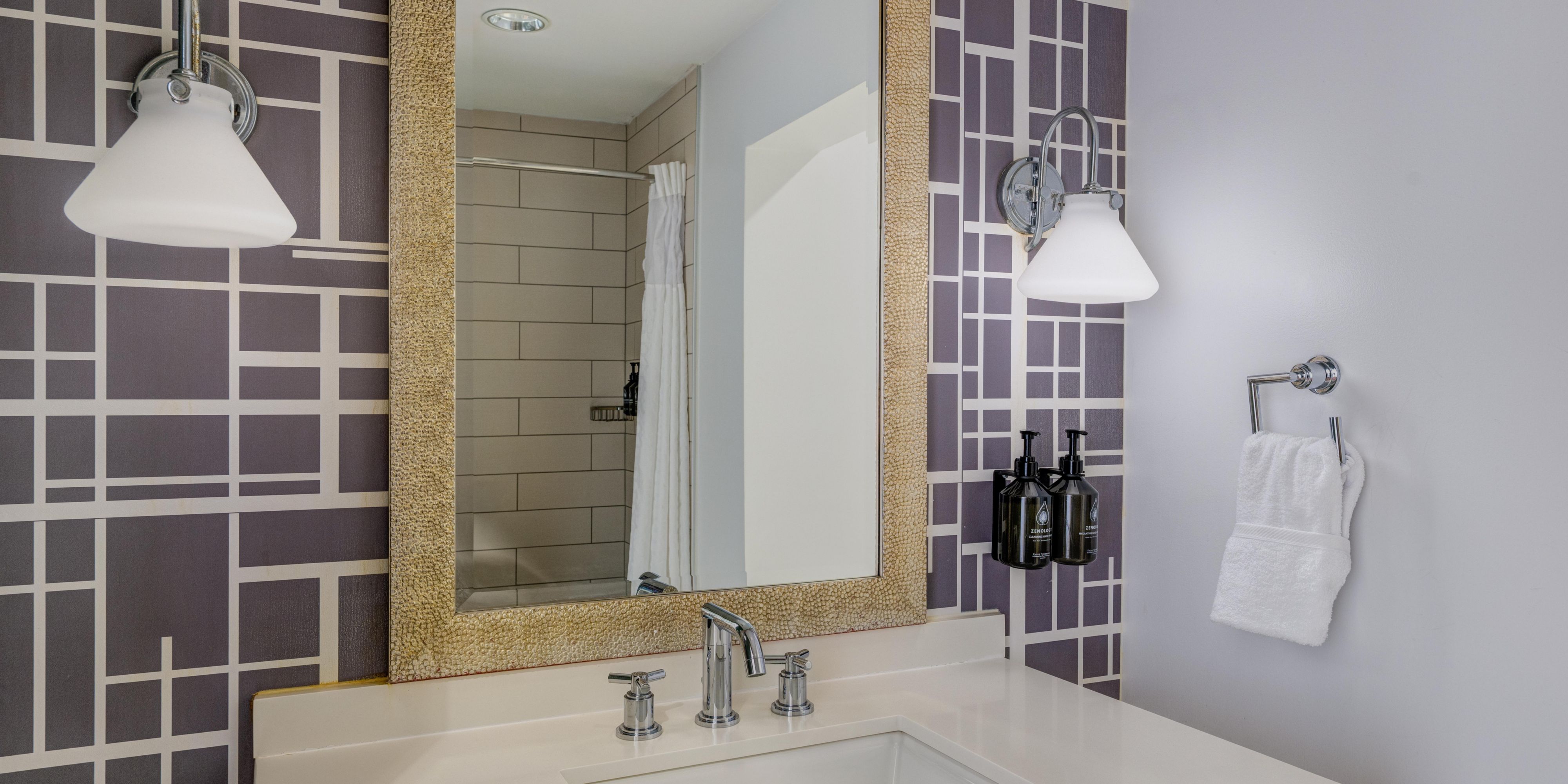 Get ready at the bathroom vanity in your suite.