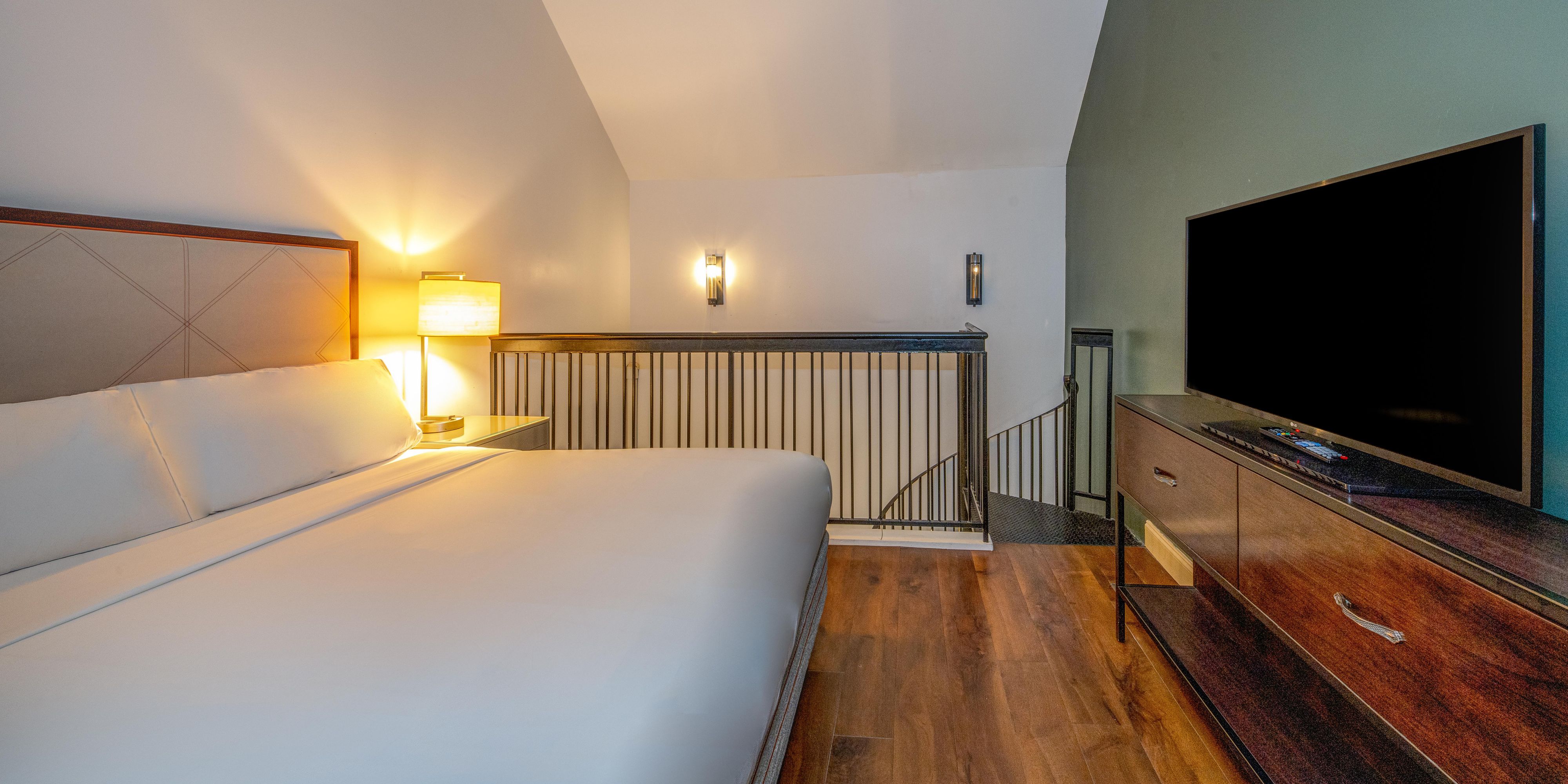 Settle in for the night in your suite's loft bedroom.