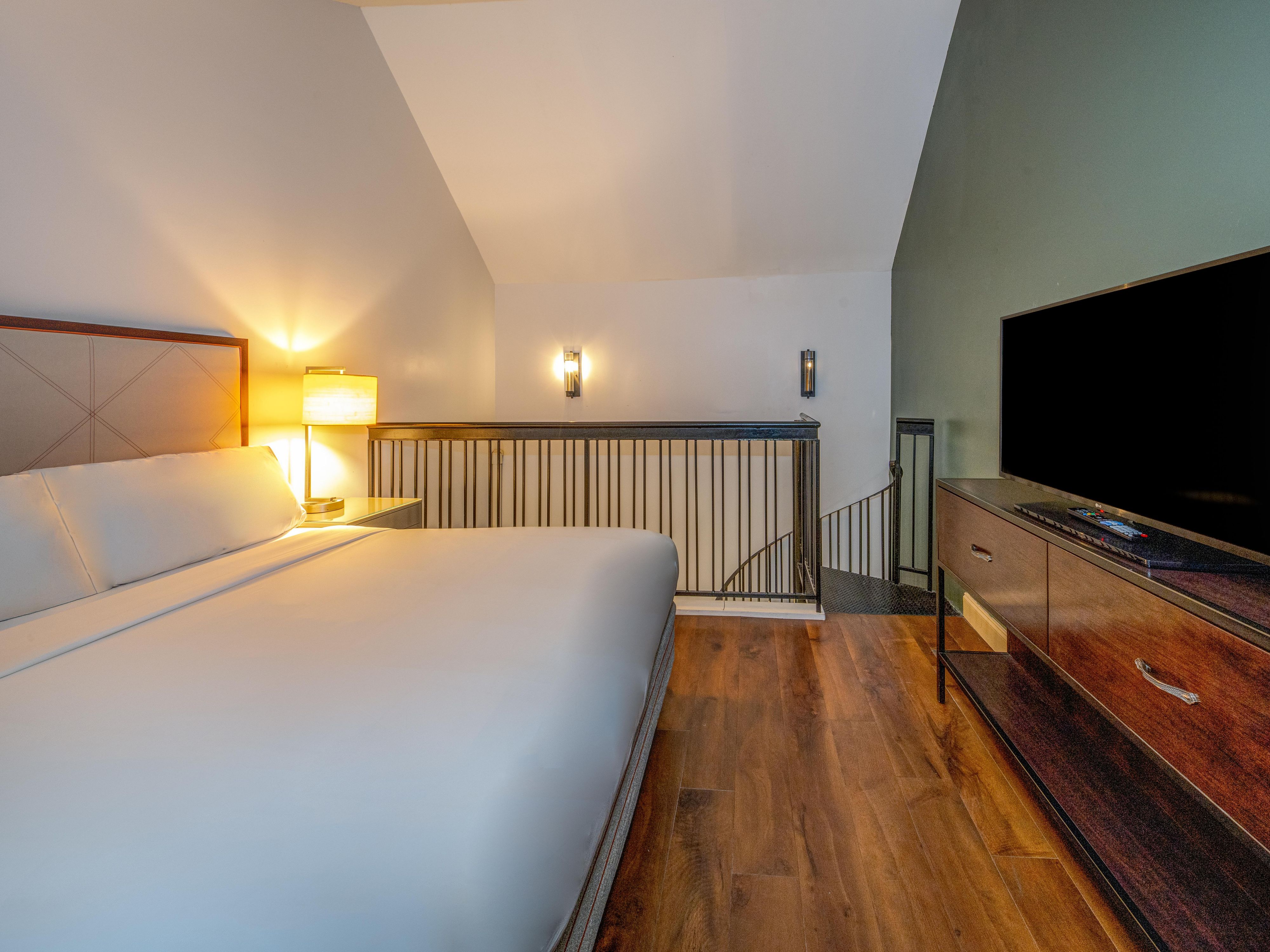 Settle in for the night in your suite's loft bedroom.
