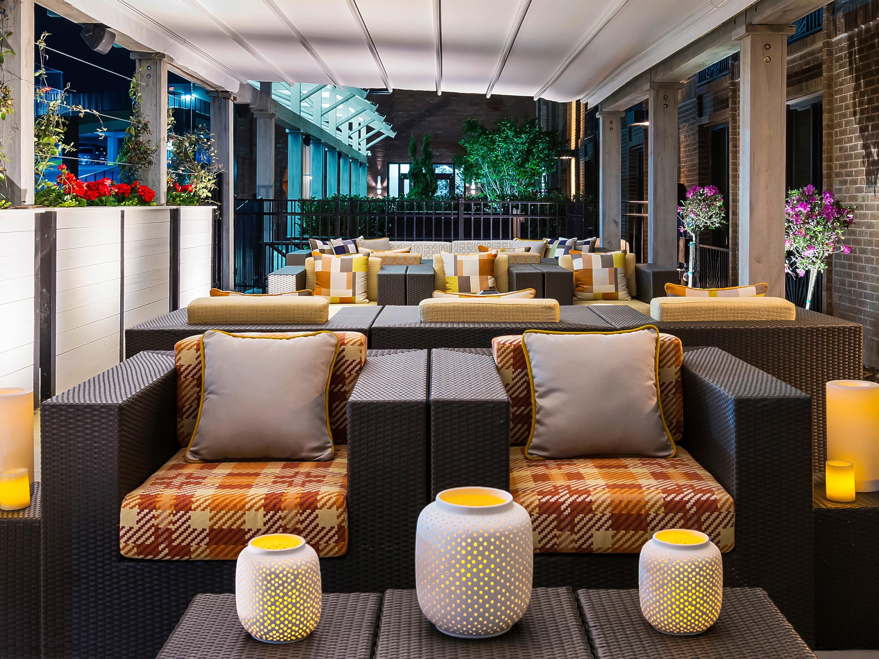 The outdoor patio area at a hotel in Savannah's historic district.